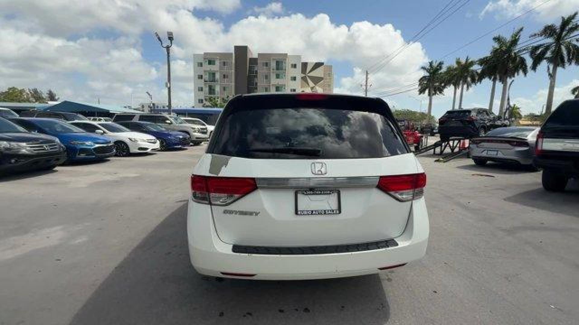 2014 White Honda Odyssey (5FNRL5H66EB) with an 6 3.5 L engine, Automatic transmission, located at 27610 S Dixie Hwy, Homestead, FL, 33032, (305) 749-2348, 25.510241, -80.438301 - KBB.com 12 Best Family Cars. Only 127,664 Miles! Boasts 28 Highway MPG and 19 City MPG! This Honda Odyssey boasts a Regular Unleaded V-6 3.5 L/212 engine powering this Automatic transmission. Window Grid Antenna, Wheels: 17 x 7 Alloy, VSA Electronic Stability Control (ESC).*This Honda Odyssey Comes - Photo#3