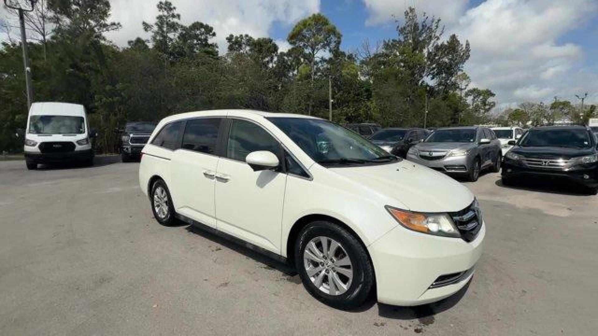 2014 White Honda Odyssey (5FNRL5H66EB) with an 6 3.5 L engine, Automatic transmission, located at 27610 S Dixie Hwy, Homestead, FL, 33032, (305) 749-2348, 25.510241, -80.438301 - KBB.com 12 Best Family Cars. Only 127,664 Miles! Boasts 28 Highway MPG and 19 City MPG! This Honda Odyssey boasts a Regular Unleaded V-6 3.5 L/212 engine powering this Automatic transmission. Window Grid Antenna, Wheels: 17 x 7 Alloy, VSA Electronic Stability Control (ESC).*This Honda Odyssey Comes - Photo#6