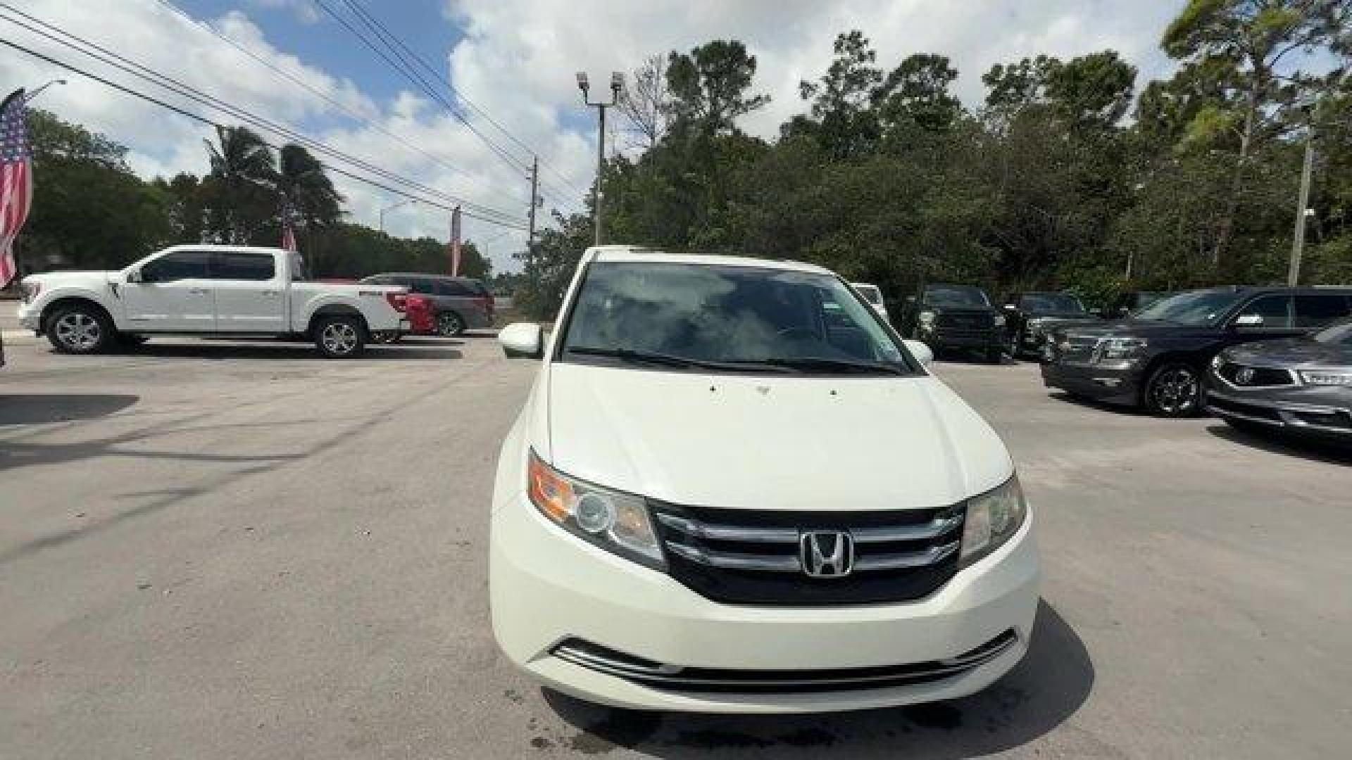 2014 White Honda Odyssey (5FNRL5H66EB) with an 6 3.5 L engine, Automatic transmission, located at 27610 S Dixie Hwy, Homestead, FL, 33032, (305) 749-2348, 25.510241, -80.438301 - KBB.com 12 Best Family Cars. Only 127,664 Miles! Boasts 28 Highway MPG and 19 City MPG! This Honda Odyssey boasts a Regular Unleaded V-6 3.5 L/212 engine powering this Automatic transmission. Window Grid Antenna, Wheels: 17 x 7 Alloy, VSA Electronic Stability Control (ESC).*This Honda Odyssey Comes - Photo#7