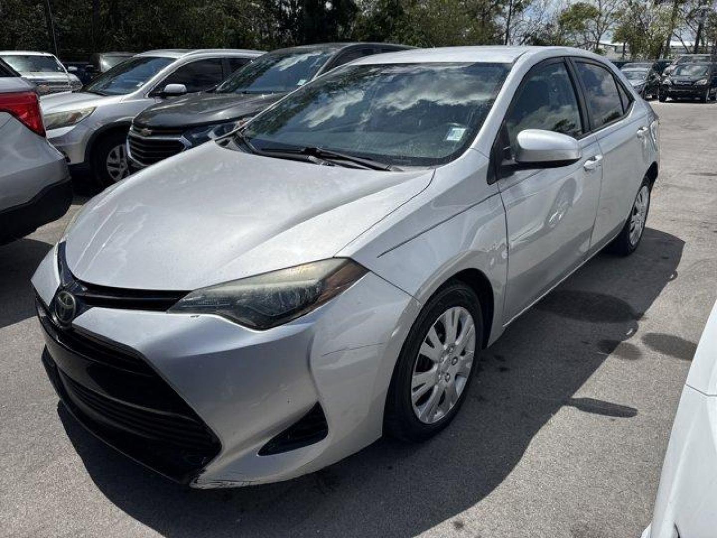 2018 Silver Toyota Corolla (5YFBURHE0JP) with an 4 1.8 L engine, Variable transmission, located at 27610 S Dixie Hwy, Homestead, FL, 33032, (305) 749-2348, 25.510241, -80.438301 - KBB.com 10 Most Awarded Brands. This Toyota Corolla boasts a Regular Unleaded I-4 1.8 L/110 engine powering this Variable transmission. Urethane Gear Shifter Material, Trunk Rear Cargo Access, Trip Computer.*This Toyota Corolla Comes Equipped with These Options *Transmission: Continuously Variable ( - Photo#3