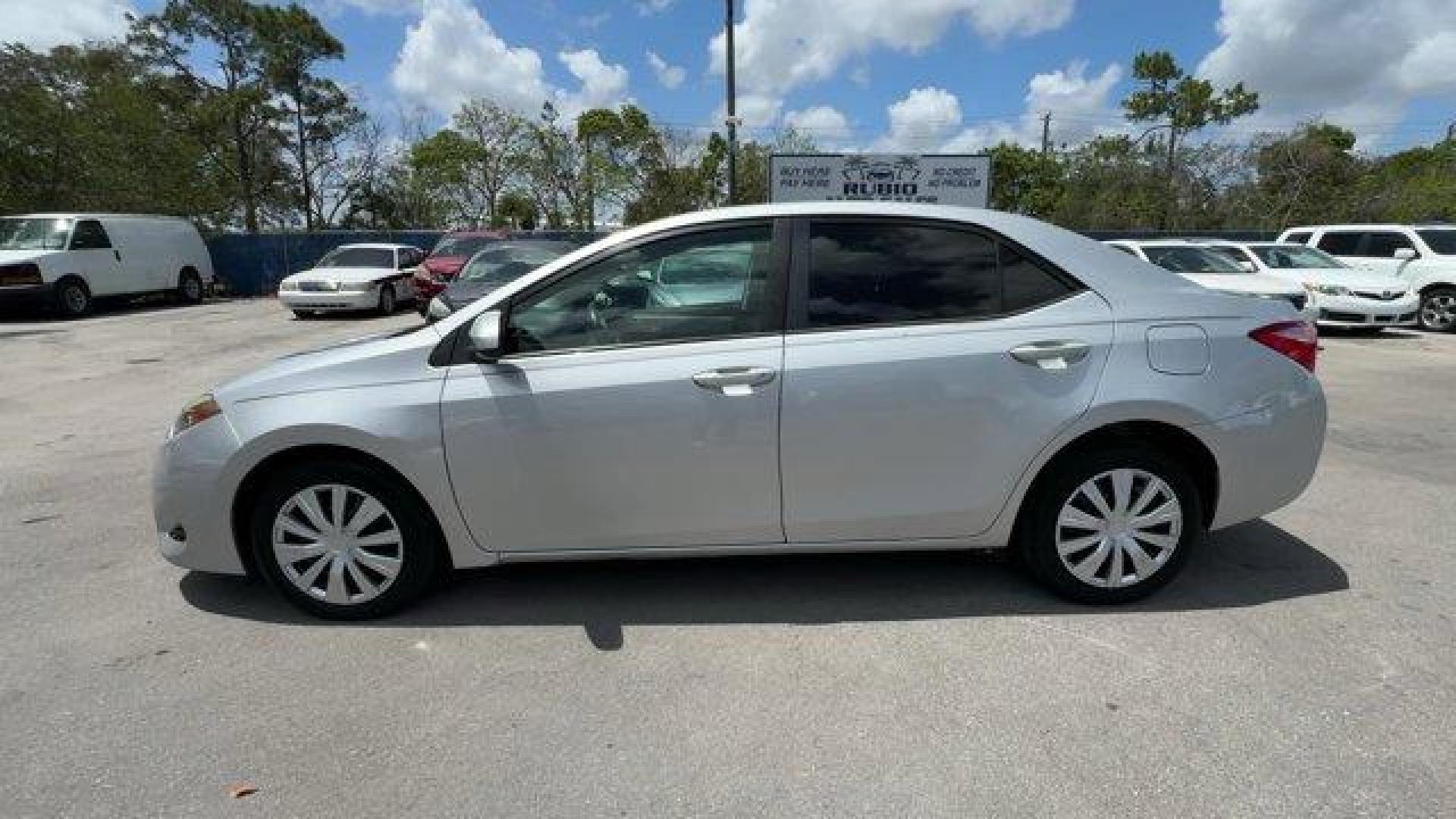 2018 Silver Toyota Corolla (5YFBURHE0JP) with an 4 1.8 L engine, Variable transmission, located at 27610 S Dixie Hwy, Homestead, FL, 33032, (305) 749-2348, 25.510241, -80.438301 - KBB.com 10 Most Awarded Brands. This Toyota Corolla boasts a Regular Unleaded I-4 1.8 L/110 engine powering this Variable transmission. Urethane Gear Shifter Material, Trunk Rear Cargo Access, Trip Computer.*This Toyota Corolla Comes Equipped with These Options *Transmission: Continuously Variable ( - Photo#0