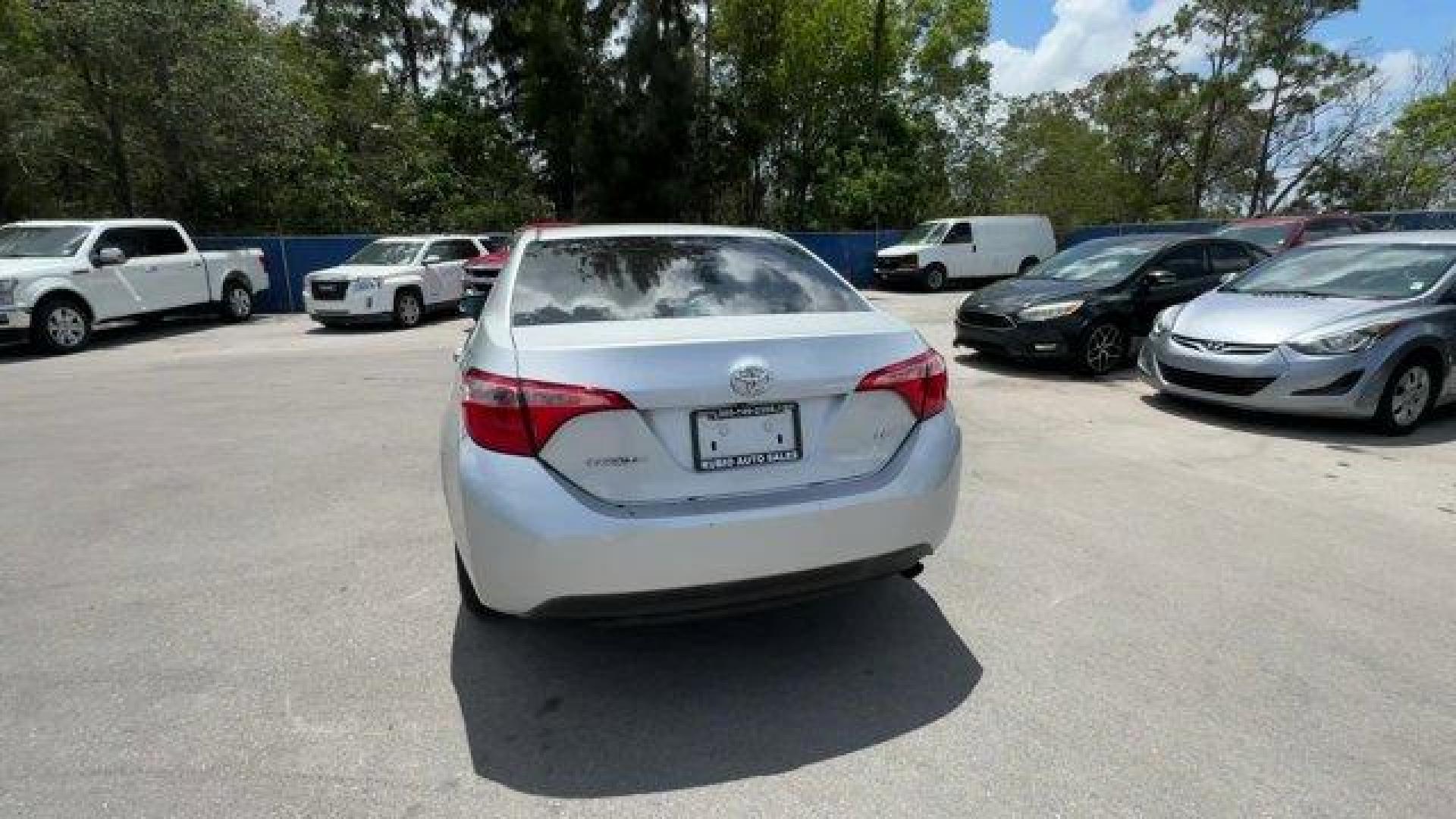 2018 Silver Toyota Corolla (5YFBURHE0JP) with an 4 1.8 L engine, Variable transmission, located at 27610 S Dixie Hwy, Homestead, FL, 33032, (305) 749-2348, 25.510241, -80.438301 - KBB.com 10 Most Awarded Brands. This Toyota Corolla boasts a Regular Unleaded I-4 1.8 L/110 engine powering this Variable transmission. Urethane Gear Shifter Material, Trunk Rear Cargo Access, Trip Computer.*This Toyota Corolla Comes Equipped with These Options *Transmission: Continuously Variable ( - Photo#2