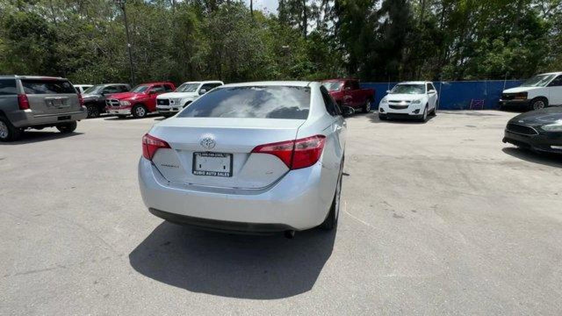 2018 Silver Toyota Corolla (5YFBURHE0JP) with an 4 1.8 L engine, Variable transmission, located at 27610 S Dixie Hwy, Homestead, FL, 33032, (305) 749-2348, 25.510241, -80.438301 - KBB.com 10 Most Awarded Brands. This Toyota Corolla boasts a Regular Unleaded I-4 1.8 L/110 engine powering this Variable transmission. Urethane Gear Shifter Material, Trunk Rear Cargo Access, Trip Computer.*This Toyota Corolla Comes Equipped with These Options *Transmission: Continuously Variable ( - Photo#4