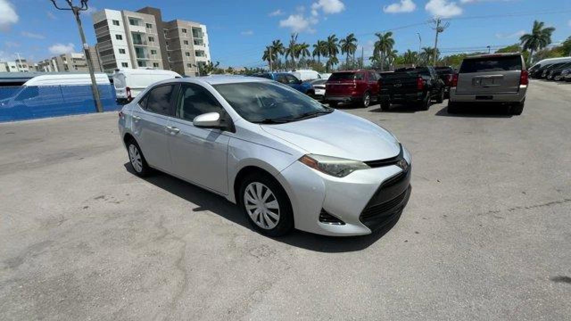 2018 Silver Toyota Corolla (5YFBURHE0JP) with an 4 1.8 L engine, Variable transmission, located at 27610 S Dixie Hwy, Homestead, FL, 33032, (305) 749-2348, 25.510241, -80.438301 - KBB.com 10 Most Awarded Brands. This Toyota Corolla boasts a Regular Unleaded I-4 1.8 L/110 engine powering this Variable transmission. Urethane Gear Shifter Material, Trunk Rear Cargo Access, Trip Computer.*This Toyota Corolla Comes Equipped with These Options *Transmission: Continuously Variable ( - Photo#6