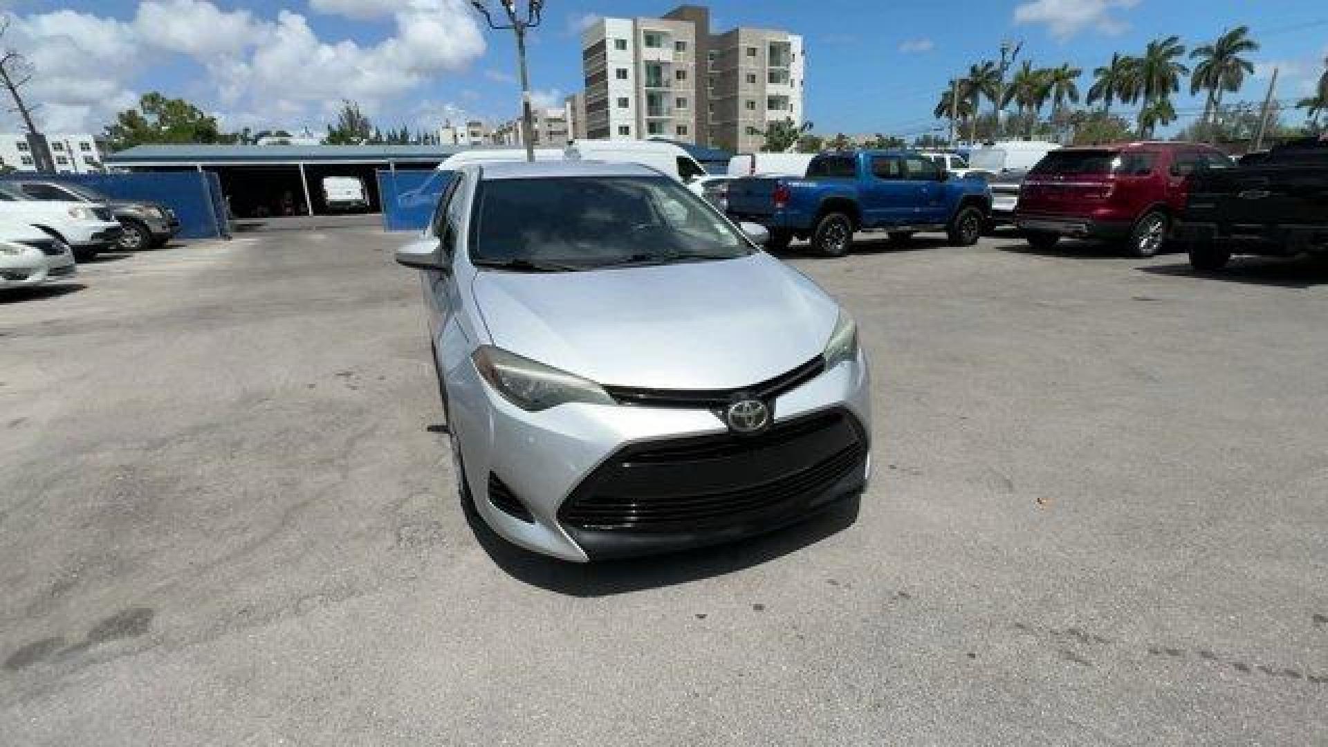 2018 Silver Toyota Corolla (5YFBURHE0JP) with an 4 1.8 L engine, Variable transmission, located at 27610 S Dixie Hwy, Homestead, FL, 33032, (305) 749-2348, 25.510241, -80.438301 - KBB.com 10 Most Awarded Brands. This Toyota Corolla boasts a Regular Unleaded I-4 1.8 L/110 engine powering this Variable transmission. Urethane Gear Shifter Material, Trunk Rear Cargo Access, Trip Computer.*This Toyota Corolla Comes Equipped with These Options *Transmission: Continuously Variable ( - Photo#7