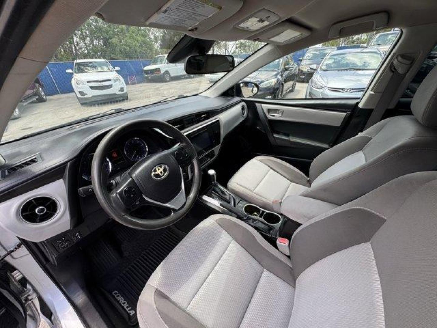 2018 Silver Toyota Corolla (5YFBURHE0JP) with an 4 1.8 L engine, Variable transmission, located at 27610 S Dixie Hwy, Homestead, FL, 33032, (305) 749-2348, 25.510241, -80.438301 - KBB.com 10 Most Awarded Brands. This Toyota Corolla boasts a Regular Unleaded I-4 1.8 L/110 engine powering this Variable transmission. Urethane Gear Shifter Material, Trunk Rear Cargo Access, Trip Computer.*This Toyota Corolla Comes Equipped with These Options *Transmission: Continuously Variable ( - Photo#11