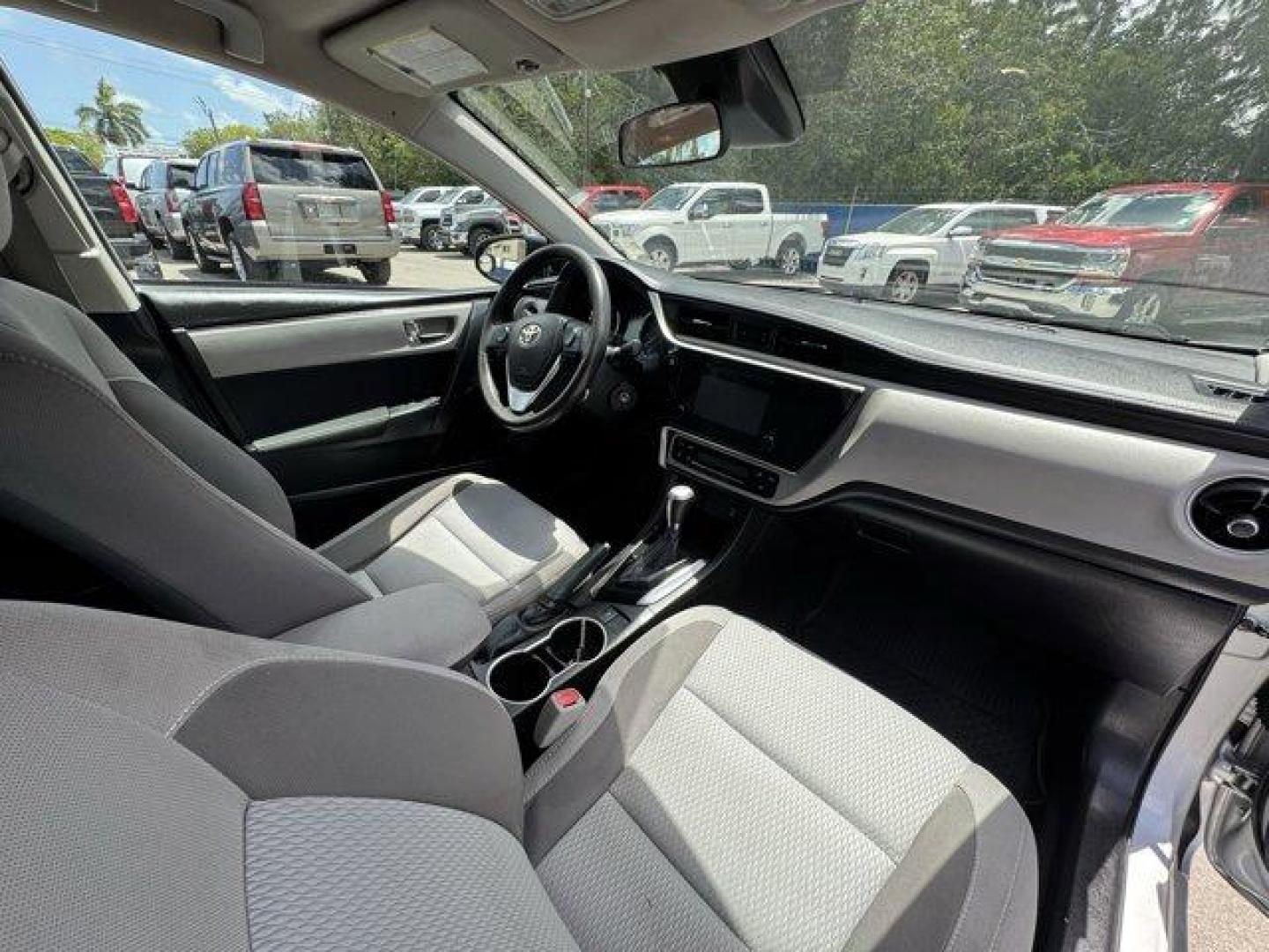 2018 Silver Toyota Corolla (5YFBURHE0JP) with an 4 1.8 L engine, Variable transmission, located at 27610 S Dixie Hwy, Homestead, FL, 33032, (305) 749-2348, 25.510241, -80.438301 - KBB.com 10 Most Awarded Brands. This Toyota Corolla boasts a Regular Unleaded I-4 1.8 L/110 engine powering this Variable transmission. Urethane Gear Shifter Material, Trunk Rear Cargo Access, Trip Computer.*This Toyota Corolla Comes Equipped with These Options *Transmission: Continuously Variable ( - Photo#12