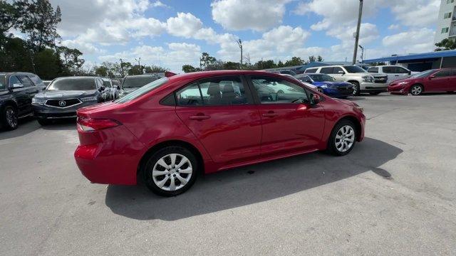 2020 Red Toyota Corolla (5YFEPRAE2LP) with an 4 1.8 L engine, Variable transmission, located at 27610 S Dixie Hwy, Homestead, FL, 33032, (305) 749-2348, 25.510241, -80.438301 - KBB.com 10 Coolest New Cars Under $20,000. Boasts 38 Highway MPG and 30 City MPG! This Toyota Corolla boasts a Regular Unleaded I-4 1.8 L/110 engine powering this Variable transmission. Wheels: 16 Wide Vent Steel, Wheels w/Full Wheel Covers, Variable Intermittent Wipers.* This Toyota Corolla Feature - Photo#5