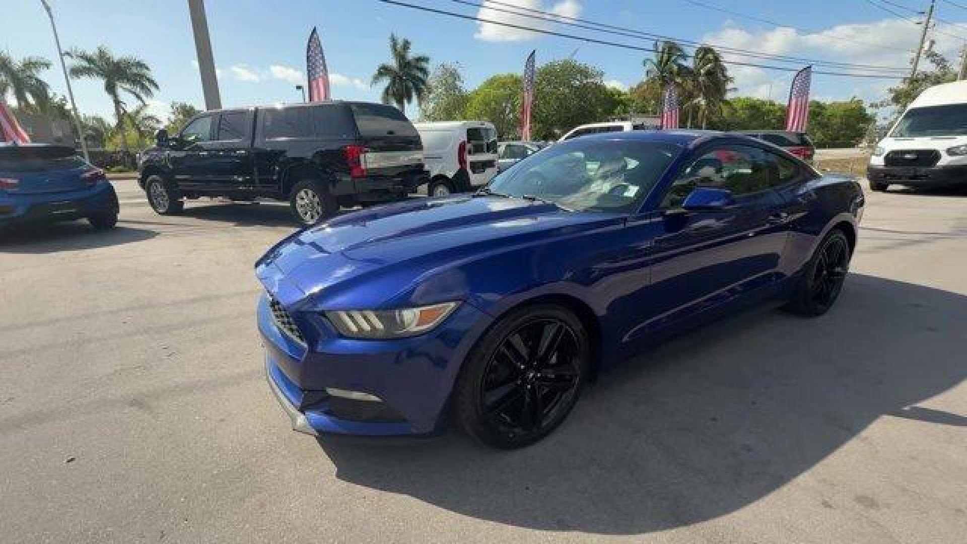 2015 Blue Ford Mustang (1FA6P8TH4F5) with an 4 2.3 L engine, Automatic transmission, located at 27610 S Dixie Hwy, Homestead, FL, 33032, (305) 749-2348, 25.510241, -80.438301 - KBB.com Best Buy Awards Finalist. Only 109,920 Miles! Boasts 31 Highway MPG and 22 City MPG! This Ford Mustang delivers a Intercooled Turbo Premium Unleaded I-4 2.3 L/140 engine powering this Automatic transmission. Trunk Rear Cargo Access, Trip Computer, Transmission: 6-Speed Manual.*This Ford Must - Photo#0