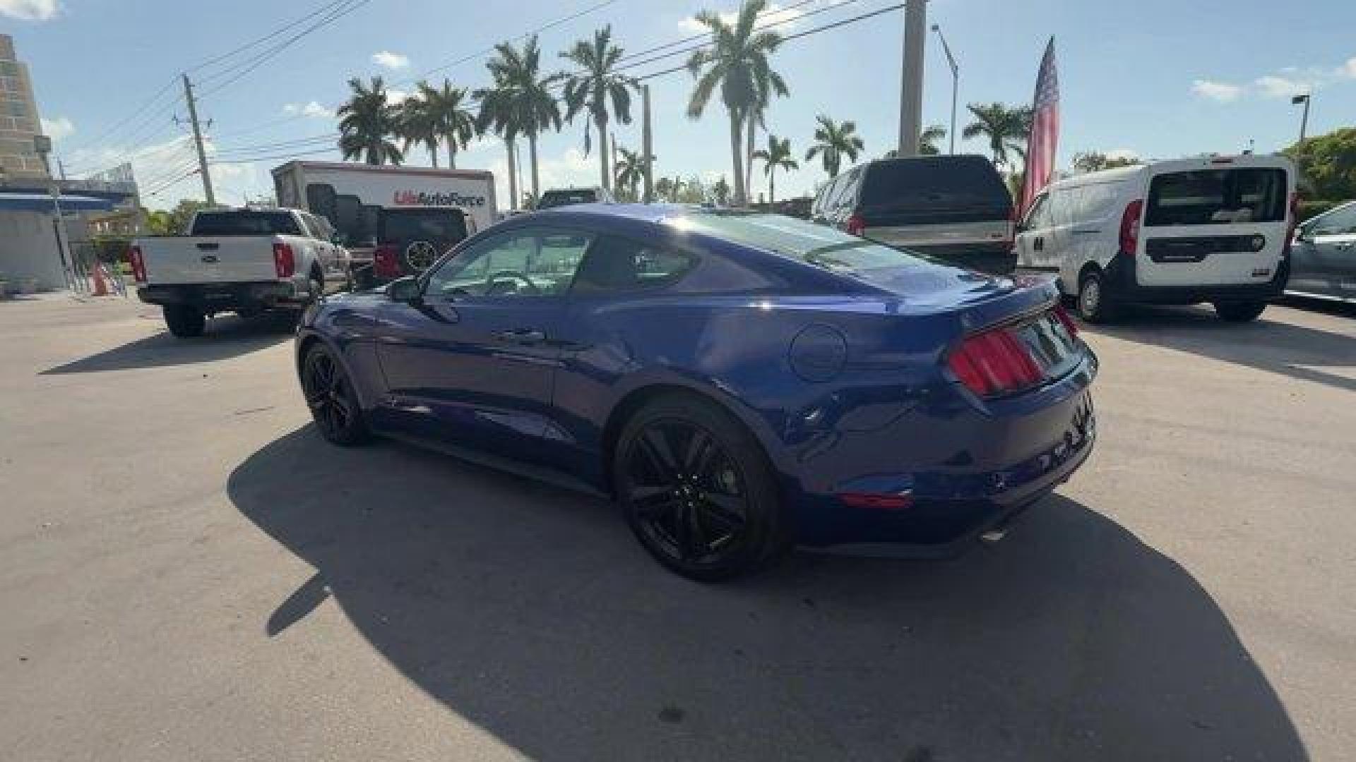 2015 Blue Ford Mustang (1FA6P8TH4F5) with an 4 2.3 L engine, Automatic transmission, located at 27610 S Dixie Hwy, Homestead, FL, 33032, (305) 749-2348, 25.510241, -80.438301 - KBB.com Best Buy Awards Finalist. Only 109,920 Miles! Boasts 31 Highway MPG and 22 City MPG! This Ford Mustang delivers a Intercooled Turbo Premium Unleaded I-4 2.3 L/140 engine powering this Automatic transmission. Trunk Rear Cargo Access, Trip Computer, Transmission: 6-Speed Manual.*This Ford Must - Photo#2