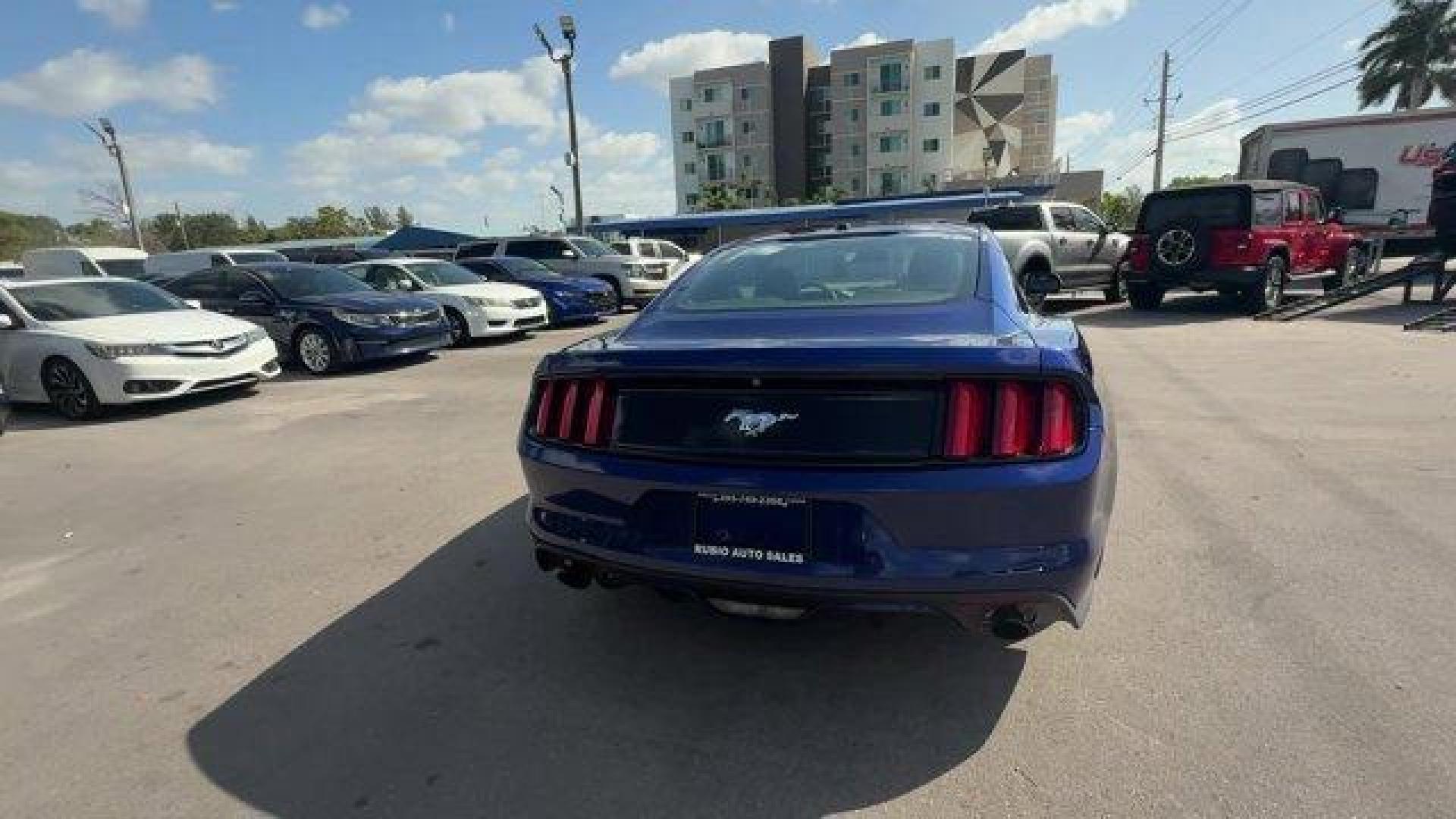 2015 Blue Ford Mustang (1FA6P8TH4F5) with an 4 2.3 L engine, Automatic transmission, located at 27610 S Dixie Hwy, Homestead, FL, 33032, (305) 749-2348, 25.510241, -80.438301 - KBB.com Best Buy Awards Finalist. Only 109,920 Miles! Boasts 31 Highway MPG and 22 City MPG! This Ford Mustang delivers a Intercooled Turbo Premium Unleaded I-4 2.3 L/140 engine powering this Automatic transmission. Trunk Rear Cargo Access, Trip Computer, Transmission: 6-Speed Manual.*This Ford Must - Photo#3