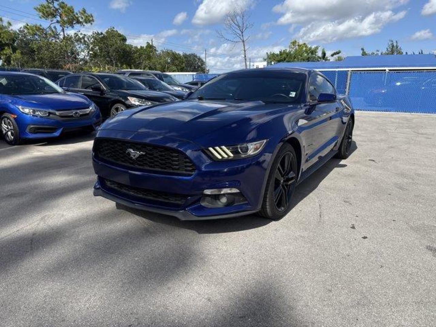 2015 Blue Ford Mustang (1FA6P8TH4F5) with an 4 2.3 L engine, Automatic transmission, located at 27610 S Dixie Hwy, Homestead, FL, 33032, (305) 749-2348, 25.510241, -80.438301 - KBB.com Best Buy Awards Finalist. Only 109,920 Miles! Boasts 31 Highway MPG and 22 City MPG! This Ford Mustang delivers a Intercooled Turbo Premium Unleaded I-4 2.3 L/140 engine powering this Automatic transmission. Trunk Rear Cargo Access, Trip Computer, Transmission: 6-Speed Manual.*This Ford Must - Photo#0