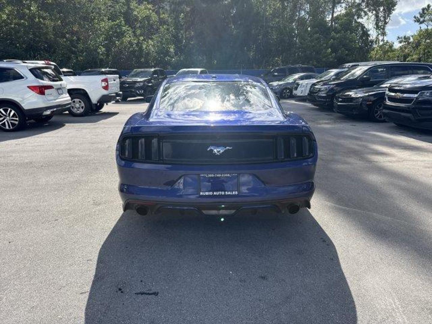 2015 Blue Ford Mustang (1FA6P8TH4F5) with an 4 2.3 L engine, Automatic transmission, located at 27610 S Dixie Hwy, Homestead, FL, 33032, (305) 749-2348, 25.510241, -80.438301 - KBB.com Best Buy Awards Finalist. Only 109,920 Miles! Boasts 31 Highway MPG and 22 City MPG! This Ford Mustang delivers a Intercooled Turbo Premium Unleaded I-4 2.3 L/140 engine powering this Automatic transmission. Trunk Rear Cargo Access, Trip Computer, Transmission: 6-Speed Manual.*This Ford Must - Photo#3
