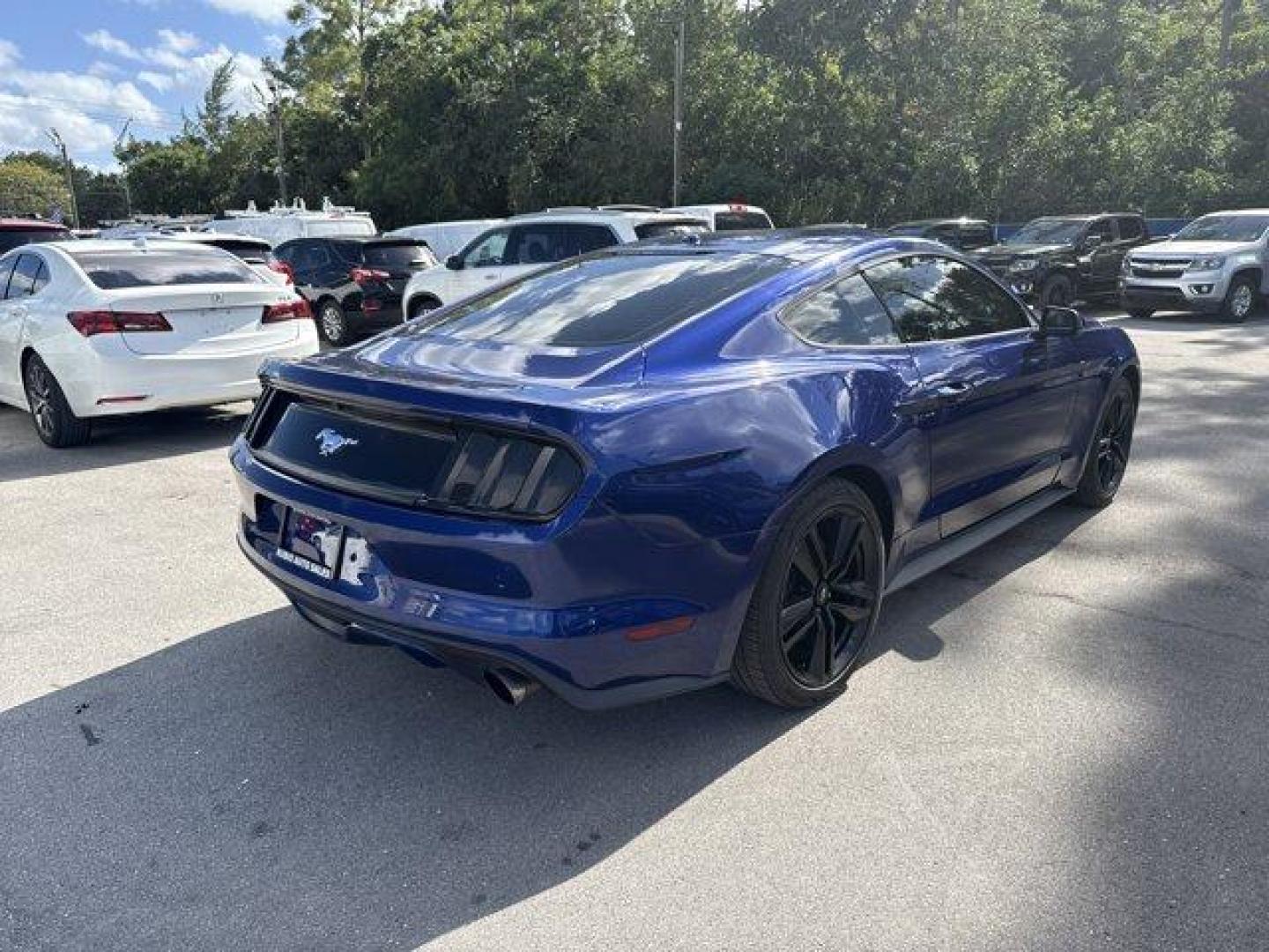 2015 Blue Ford Mustang (1FA6P8TH4F5) with an 4 2.3 L engine, Automatic transmission, located at 27610 S Dixie Hwy, Homestead, FL, 33032, (305) 749-2348, 25.510241, -80.438301 - KBB.com Best Buy Awards Finalist. Only 109,920 Miles! Boasts 31 Highway MPG and 22 City MPG! This Ford Mustang delivers a Intercooled Turbo Premium Unleaded I-4 2.3 L/140 engine powering this Automatic transmission. Trunk Rear Cargo Access, Trip Computer, Transmission: 6-Speed Manual.*This Ford Must - Photo#4