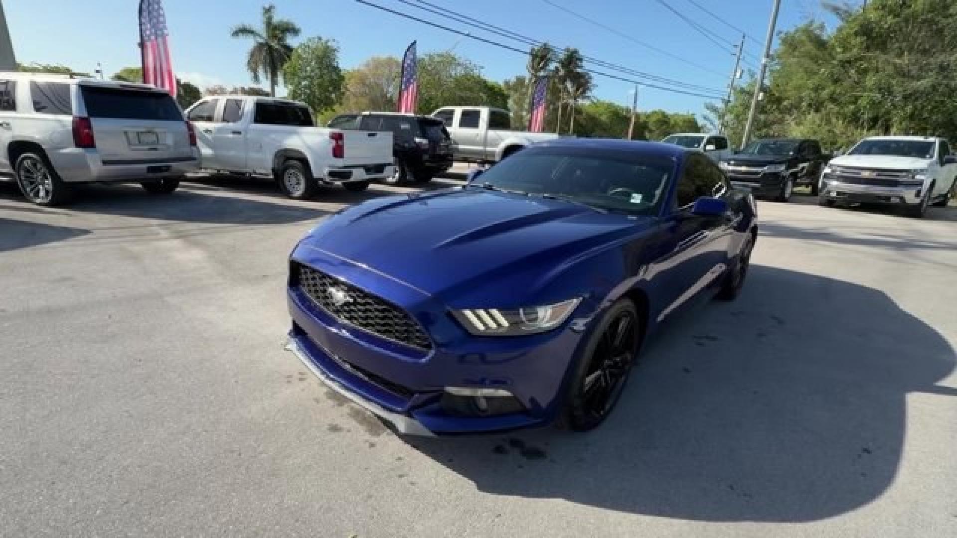 2015 Blue Ford Mustang (1FA6P8TH4F5) with an 4 2.3 L engine, Automatic transmission, located at 27610 S Dixie Hwy, Homestead, FL, 33032, (305) 749-2348, 25.510241, -80.438301 - KBB.com Best Buy Awards Finalist. Only 109,920 Miles! Boasts 31 Highway MPG and 22 City MPG! This Ford Mustang delivers a Intercooled Turbo Premium Unleaded I-4 2.3 L/140 engine powering this Automatic transmission. Trunk Rear Cargo Access, Trip Computer, Transmission: 6-Speed Manual.*This Ford Must - Photo#0