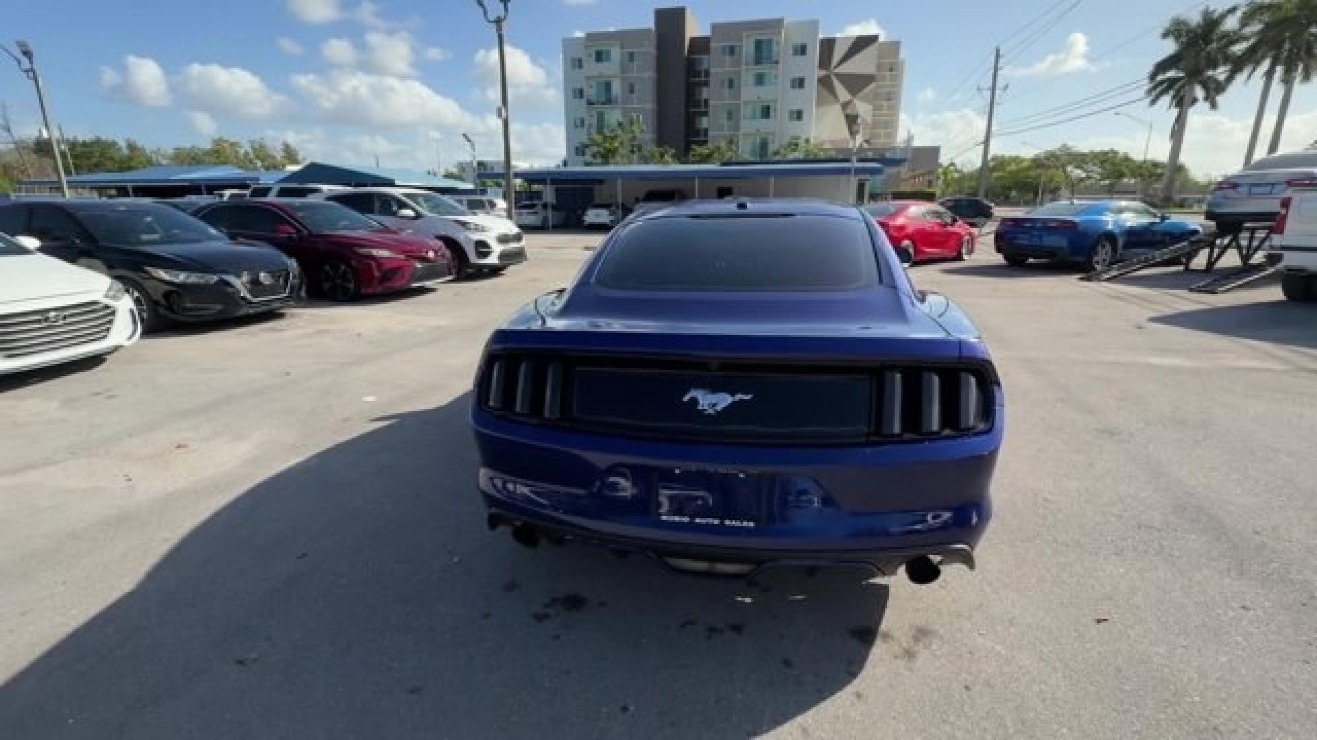 2015 Blue Ford Mustang (1FA6P8TH4F5) with an 4 2.3 L engine, Automatic transmission, located at 27610 S Dixie Hwy, Homestead, FL, 33032, (305) 749-2348, 25.510241, -80.438301 - KBB.com Best Buy Awards Finalist. Only 109,920 Miles! Boasts 31 Highway MPG and 22 City MPG! This Ford Mustang delivers a Intercooled Turbo Premium Unleaded I-4 2.3 L/140 engine powering this Automatic transmission. Trunk Rear Cargo Access, Trip Computer, Transmission: 6-Speed Manual.*This Ford Must - Photo#1