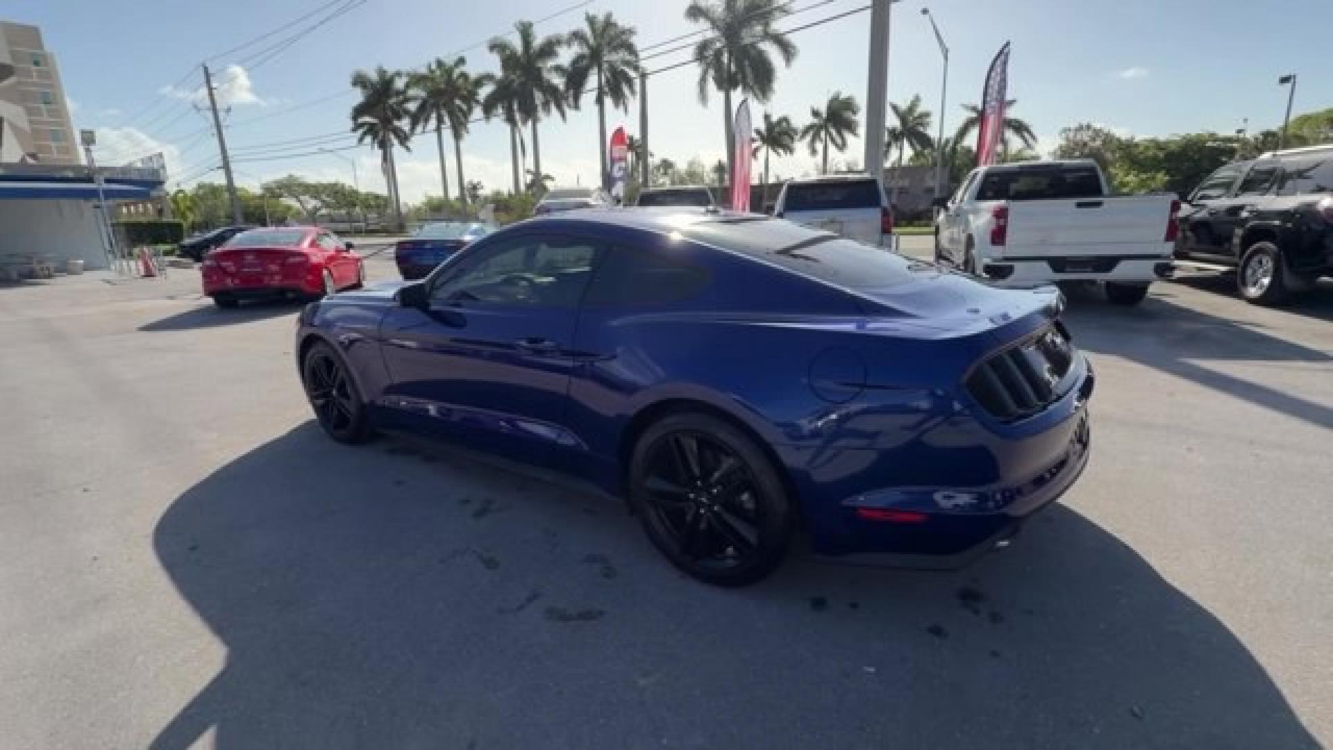 2015 Blue Ford Mustang (1FA6P8TH4F5) with an 4 2.3 L engine, Automatic transmission, located at 27610 S Dixie Hwy, Homestead, FL, 33032, (305) 749-2348, 25.510241, -80.438301 - KBB.com Best Buy Awards Finalist. Only 109,920 Miles! Boasts 31 Highway MPG and 22 City MPG! This Ford Mustang delivers a Intercooled Turbo Premium Unleaded I-4 2.3 L/140 engine powering this Automatic transmission. Trunk Rear Cargo Access, Trip Computer, Transmission: 6-Speed Manual.*This Ford Must - Photo#4