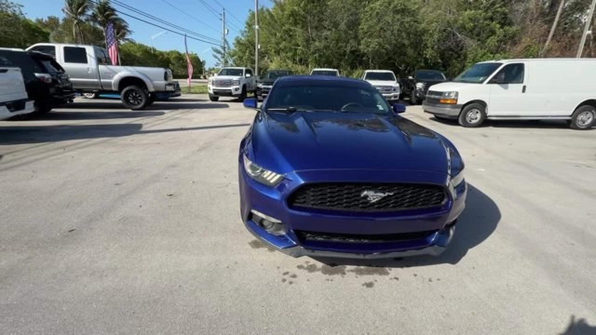 2015 Blue Ford Mustang (1FA6P8TH4F5) with an 4 2.3 L engine, Automatic transmission, located at 27610 S Dixie Hwy, Homestead, FL, 33032, (305) 749-2348, 25.510241, -80.438301 - KBB.com Best Buy Awards Finalist. Only 109,920 Miles! Boasts 31 Highway MPG and 22 City MPG! This Ford Mustang delivers a Intercooled Turbo Premium Unleaded I-4 2.3 L/140 engine powering this Automatic transmission. Trunk Rear Cargo Access, Trip Computer, Transmission: 6-Speed Manual.*This Ford Must - Photo#5