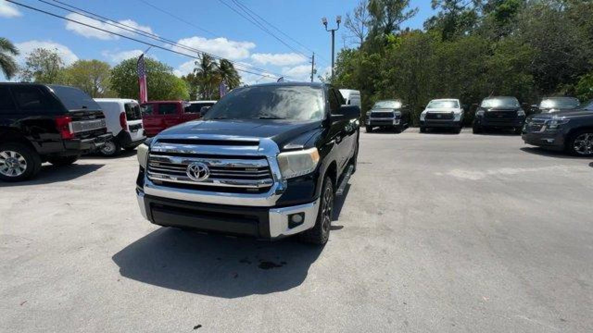 2016 Black Toyota Tundra 2WD Truck (5TFRW5F18GX) with an 8 5.7 L engine, Automatic transmission, located at 27610 S Dixie Hwy, Homestead, FL, 33032, (305) 749-2348, 25.510241, -80.438301 - Boasts 18 Highway MPG and 13 City MPG! This Toyota Tundra 2WD Truck delivers a Regular Unleaded V-8 5.7 L/346 engine powering this Automatic transmission. Wheels: 18 x 8J Styled Steel, Variable Intermittent Wipers w/Heated Wiper Park, Urethane Gear Shifter Material.*This Toyota Tundra 2WD Truck Come - Photo#0