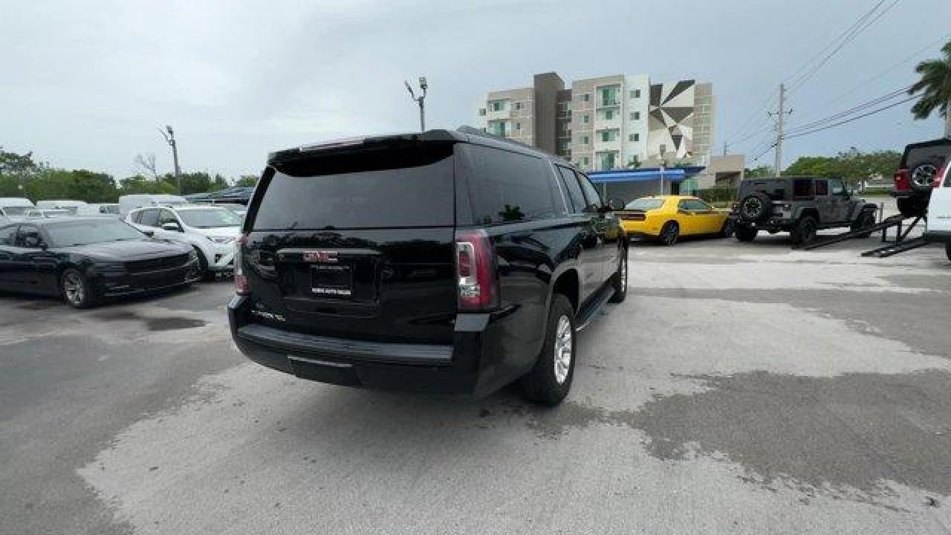 2018 Onyx Black /Jet Black GMC Yukon XL (1GKS2GKC0JR) with an 8 5.3L engine, Automatic transmission, located at 27610 S Dixie Hwy, Homestead, FL, 33032, (305) 749-2348, 25.510241, -80.438301 - Delivers 22 Highway MPG and 15 City MPG! This GMC Yukon XL delivers a Gas V8 5.3L/325 engine powering this Automatic transmission. WHEELS, 18 X 8.5 (45.7 CM X 21.6 CM) BRIGHT MACHINED ALUMINUM (STD), TRANSMISSION, 6-SPEED AUTOMATIC, ELECTRONICALLY CONTROLLED with overdrive, tow/haul mode and tap up/ - Photo#4
