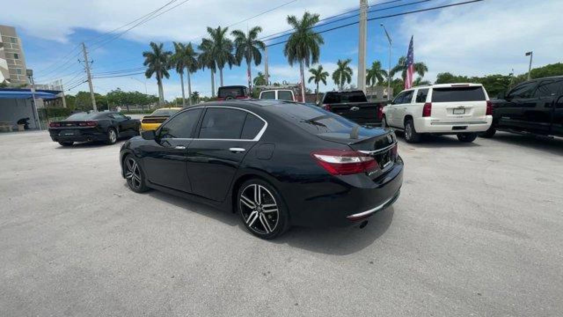 2017 Black Honda Accord Sedan Sport Special Edition (1HGCR2F1XHA) with an 4 2.4 L engine, Variable transmission, located at 27610 S Dixie Hwy, Homestead, FL, 33032, (305) 749-2348, 25.510241, -80.438301 - IIHS Top Safety Pick+. Scores 34 Highway MPG and 26 City MPG! This Honda Accord Sedan delivers a Regular Unleaded I-4 2.4 L/144 engine powering this Variable transmission. Window Grid Antenna, Wheels: 19 Alloy, VSA Electronic Stability Control (ESC).* This Honda Accord Sedan Features the Following O - Photo#2