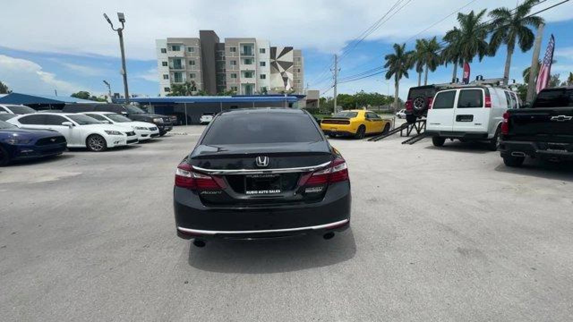 2017 Black Honda Accord Sedan Sport Special Edition (1HGCR2F1XHA) with an 4 2.4 L engine, Variable transmission, located at 27610 S Dixie Hwy, Homestead, FL, 33032, (305) 749-2348, 25.510241, -80.438301 - IIHS Top Safety Pick+. Scores 34 Highway MPG and 26 City MPG! This Honda Accord Sedan delivers a Regular Unleaded I-4 2.4 L/144 engine powering this Variable transmission. Window Grid Antenna, Wheels: 19 Alloy, VSA Electronic Stability Control (ESC).* This Honda Accord Sedan Features the Following O - Photo#3