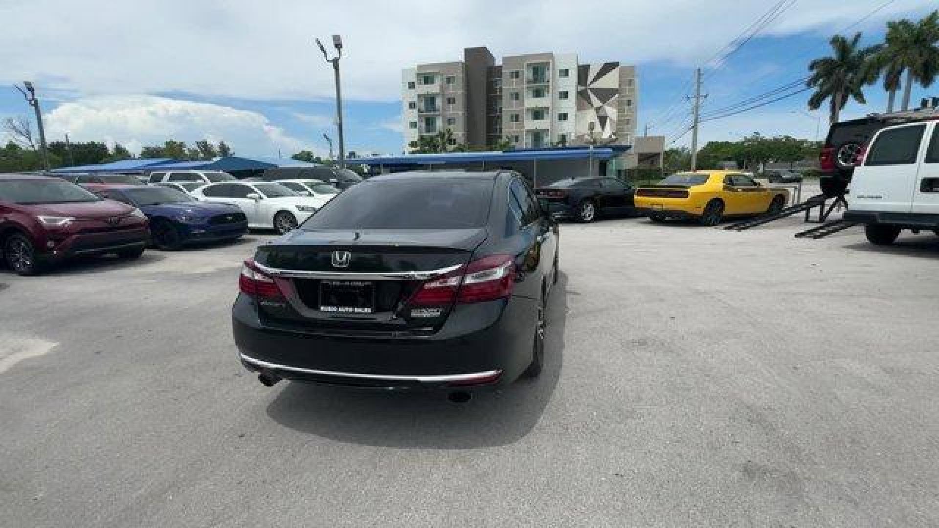 2017 Black Honda Accord Sedan Sport Special Edition (1HGCR2F1XHA) with an 4 2.4 L engine, Variable transmission, located at 27610 S Dixie Hwy, Homestead, FL, 33032, (305) 749-2348, 25.510241, -80.438301 - IIHS Top Safety Pick+. Scores 34 Highway MPG and 26 City MPG! This Honda Accord Sedan delivers a Regular Unleaded I-4 2.4 L/144 engine powering this Variable transmission. Window Grid Antenna, Wheels: 19 Alloy, VSA Electronic Stability Control (ESC).* This Honda Accord Sedan Features the Following O - Photo#4