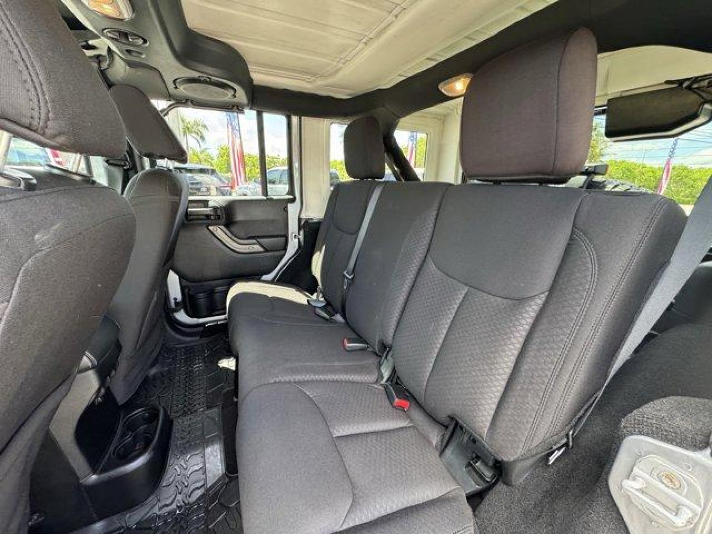 2014 Billet Metallic Clearcoat /Black Jeep Wrangler Unlimited (1C4BJWDG7EL) with an 6 3.6 L engine, Automatic transmission, located at 27610 S Dixie Hwy, Homestead, FL, 33032, (305) 749-2348, 25.510241, -80.438301 - Only 94,538 Miles! Scores 20 Highway MPG and 16 City MPG! This Jeep Wrangler Unlimited boasts a Regular Unleaded V-6 3.6 L/220 engine powering this Automatic transmission. SIRIUS SATELLITE RADIO (subscription required), ENGINE: 3.6L V6 24V VVT (STD), ANTI-SPIN DIFFERENTIAL REAR AXLE.*This Jeep Wrang - Photo#11