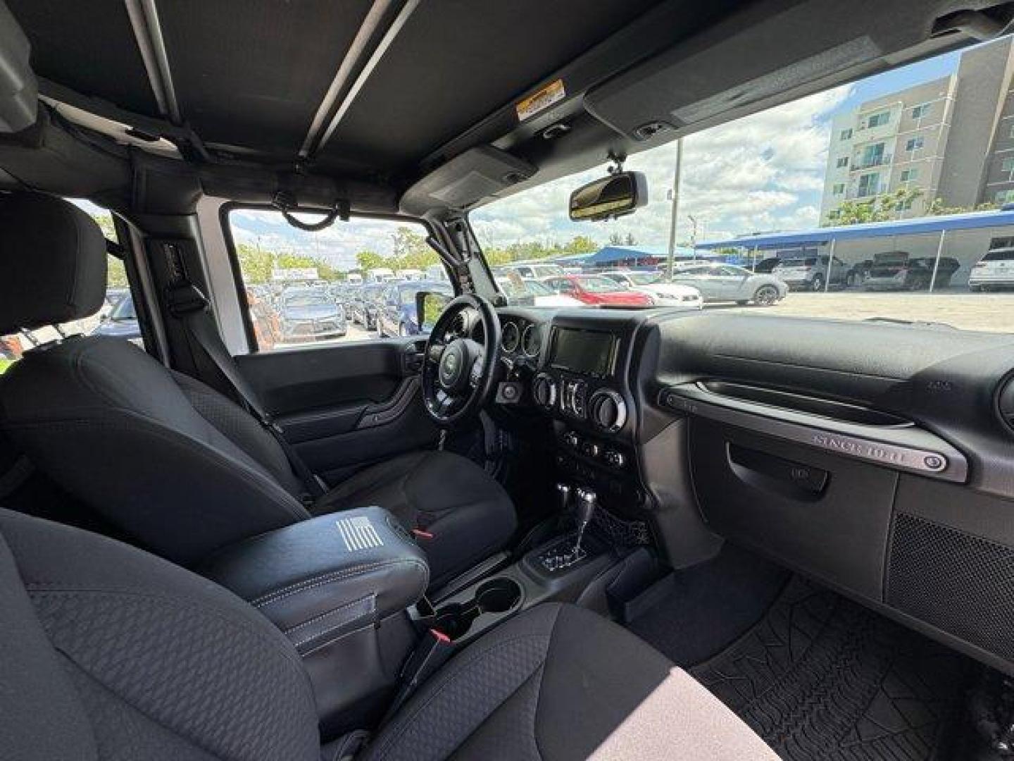 2014 Billet Metallic Clearcoat /Black Jeep Wrangler Unlimited (1C4BJWDG7EL) with an 6 3.6 L engine, Automatic transmission, located at 27610 S Dixie Hwy, Homestead, FL, 33032, (305) 749-2348, 25.510241, -80.438301 - Only 94,538 Miles! Scores 20 Highway MPG and 16 City MPG! This Jeep Wrangler Unlimited boasts a Regular Unleaded V-6 3.6 L/220 engine powering this Automatic transmission. SIRIUS SATELLITE RADIO (subscription required), ENGINE: 3.6L V6 24V VVT (STD), ANTI-SPIN DIFFERENTIAL REAR AXLE.*This Jeep Wrang - Photo#12