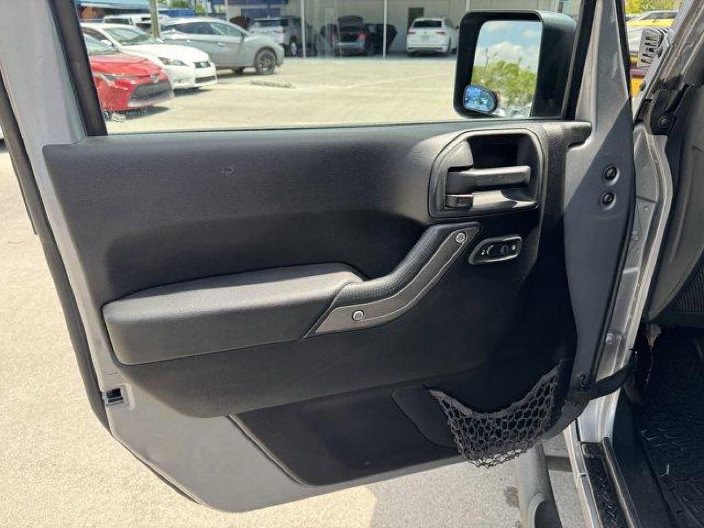 2014 Billet Metallic Clearcoat /Black Jeep Wrangler Unlimited (1C4BJWDG7EL) with an 6 3.6 L engine, Automatic transmission, located at 27610 S Dixie Hwy, Homestead, FL, 33032, (305) 749-2348, 25.510241, -80.438301 - Only 94,538 Miles! Scores 20 Highway MPG and 16 City MPG! This Jeep Wrangler Unlimited boasts a Regular Unleaded V-6 3.6 L/220 engine powering this Automatic transmission. SIRIUS SATELLITE RADIO (subscription required), ENGINE: 3.6L V6 24V VVT (STD), ANTI-SPIN DIFFERENTIAL REAR AXLE.*This Jeep Wrang - Photo#14