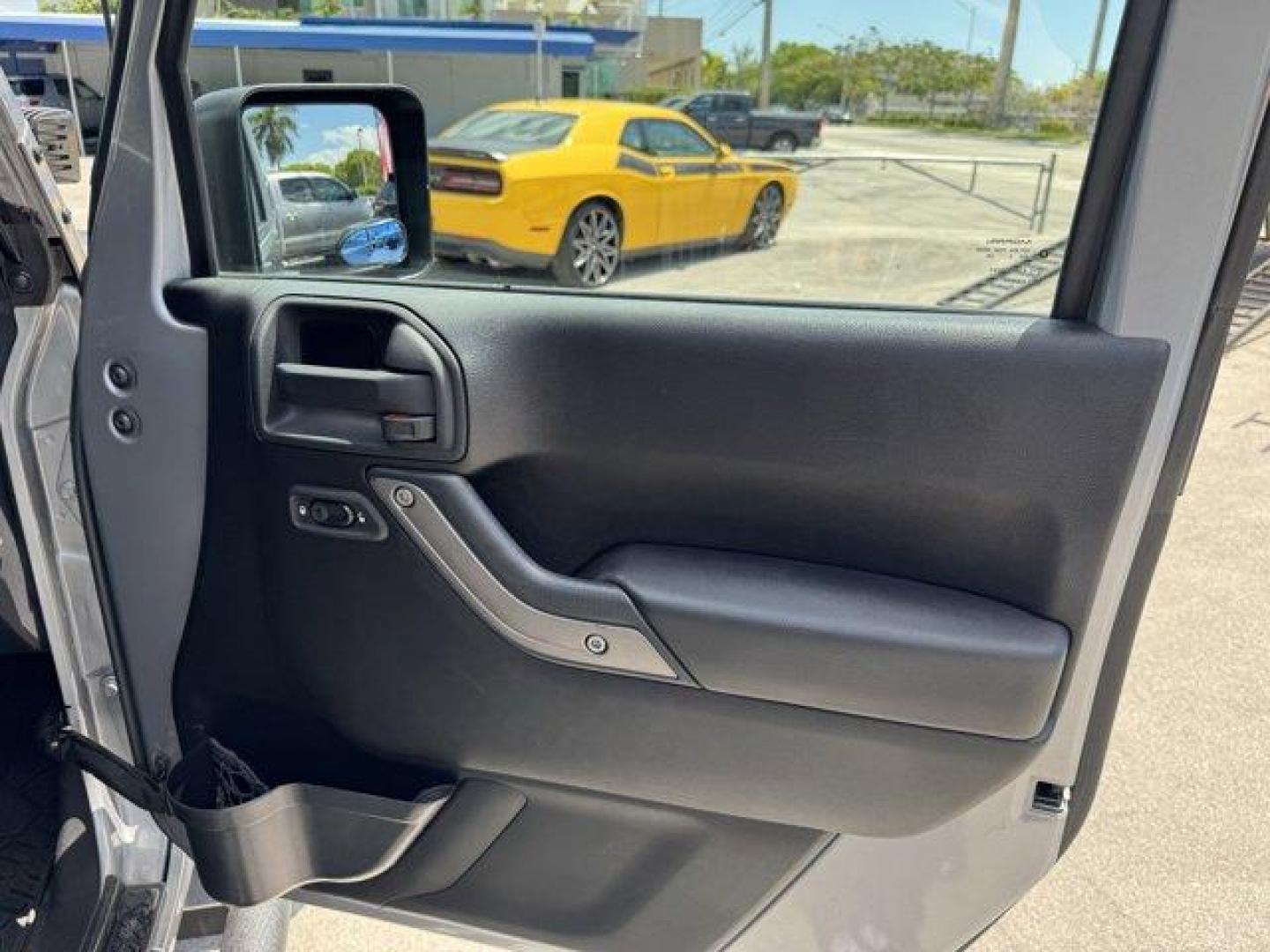 2014 Billet Metallic Clearcoat /Black Jeep Wrangler Unlimited (1C4BJWDG7EL) with an 6 3.6 L engine, Automatic transmission, located at 27610 S Dixie Hwy, Homestead, FL, 33032, (305) 749-2348, 25.510241, -80.438301 - Only 94,538 Miles! Scores 20 Highway MPG and 16 City MPG! This Jeep Wrangler Unlimited boasts a Regular Unleaded V-6 3.6 L/220 engine powering this Automatic transmission. SIRIUS SATELLITE RADIO (subscription required), ENGINE: 3.6L V6 24V VVT (STD), ANTI-SPIN DIFFERENTIAL REAR AXLE.*This Jeep Wrang - Photo#15