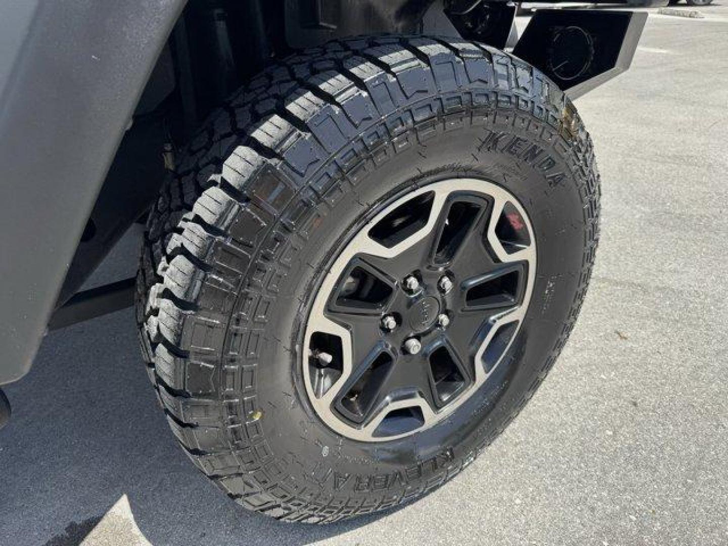 2014 Billet Metallic Clearcoat /Black Jeep Wrangler Unlimited (1C4BJWDG7EL) with an 6 3.6 L engine, Automatic transmission, located at 27610 S Dixie Hwy, Homestead, FL, 33032, (305) 749-2348, 25.510241, -80.438301 - Only 94,538 Miles! Scores 20 Highway MPG and 16 City MPG! This Jeep Wrangler Unlimited boasts a Regular Unleaded V-6 3.6 L/220 engine powering this Automatic transmission. SIRIUS SATELLITE RADIO (subscription required), ENGINE: 3.6L V6 24V VVT (STD), ANTI-SPIN DIFFERENTIAL REAR AXLE.*This Jeep Wrang - Photo#17