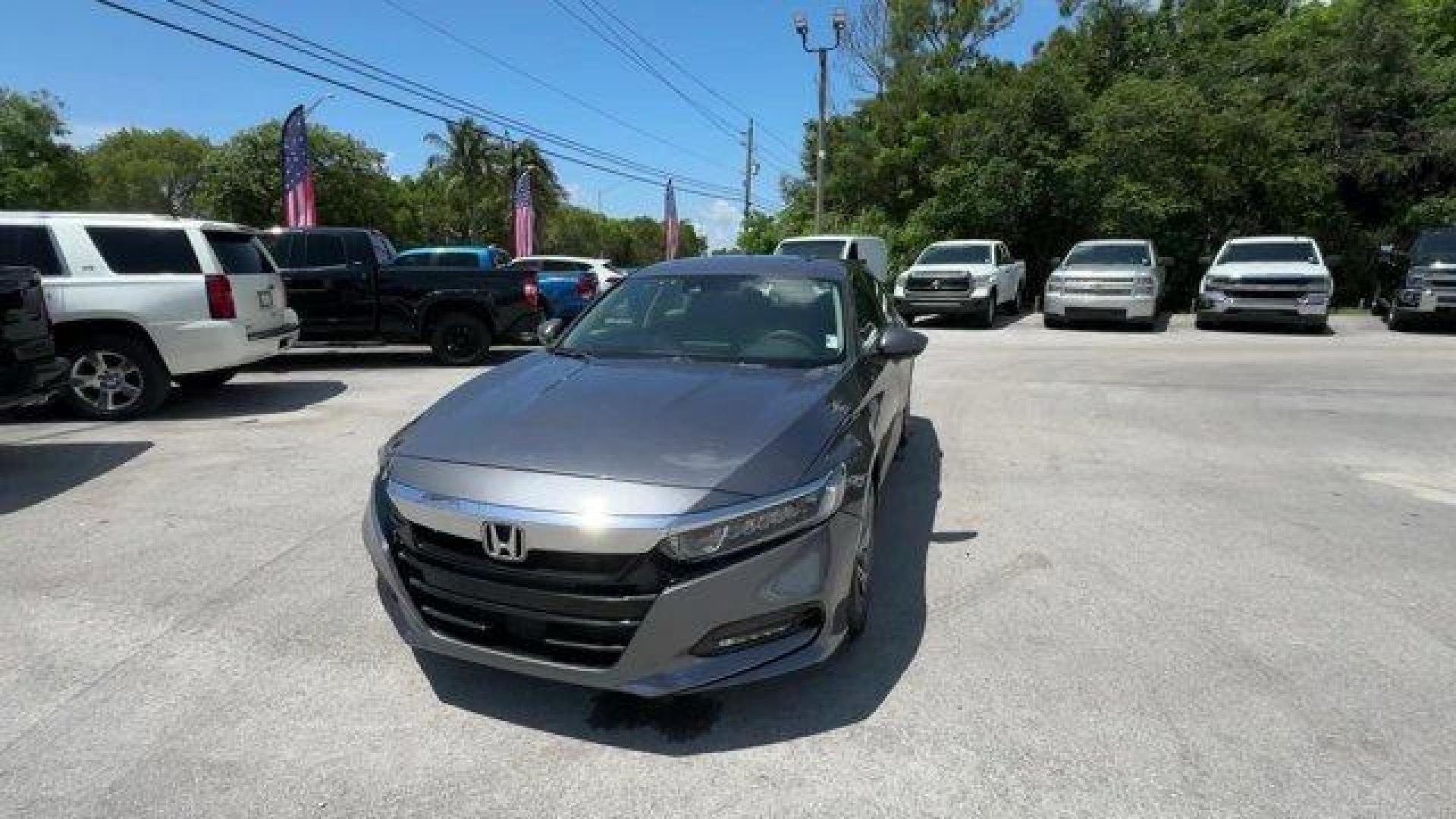 2018 Gray Honda Accord Sedan (1HGCV1F48JA) with an 4 1.5 L engine, Variable transmission, located at 27610 S Dixie Hwy, Homestead, FL, 33032, (305) 749-2348, 25.510241, -80.438301 - ALG Residual Value Awards, Residual Value Awards. Only 62,519 Miles! Boasts 38 Highway MPG and 30 City MPG! This Honda Accord Sedan boasts a Intercooled Turbo Regular Unleaded I-4 1.5 L/91 engine powering this Variable transmission. Wheels: 17 Machine-Finished Alloy, VSA Electronic Stability Control - Photo#0