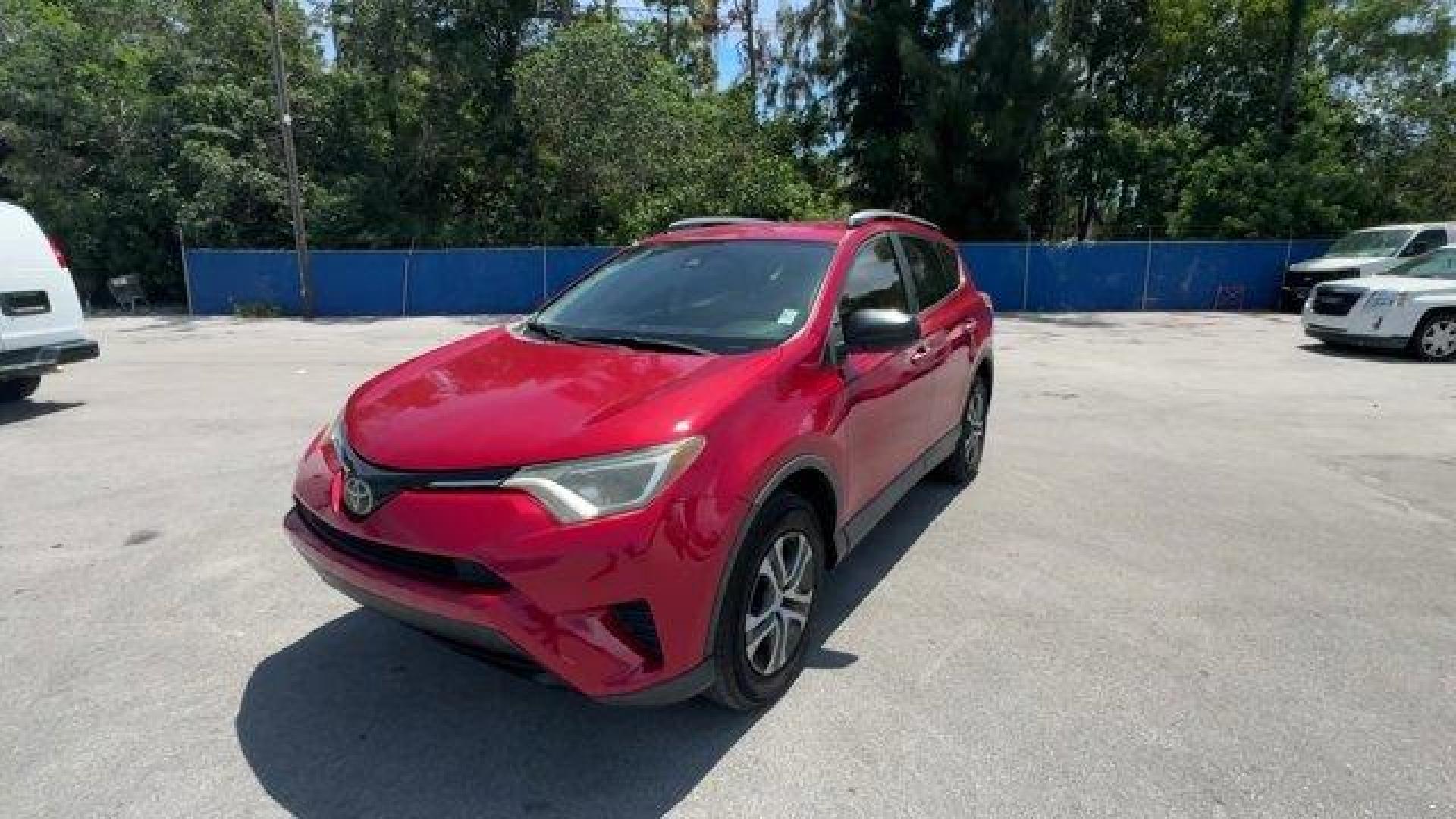 2017 Red Toyota RAV4 (2T3ZFREV3HW) with an 4 2.5 L engine, Automatic transmission, located at 27610 S Dixie Hwy, Homestead, FL, 33032, (305) 749-2348, 25.510241, -80.438301 - IIHS Top Safety Pick+. Only 95,766 Miles! Delivers 30 Highway MPG and 23 City MPG! This Toyota RAV4 boasts a Regular Unleaded I-4 2.5 L/152 engine powering this Automatic transmission. Wheels: 17 x 6.5J -inc: caps, Urethane Gear Shifter Material, Trip Computer.*This Toyota RAV4 Comes Equipped with T - Photo#0