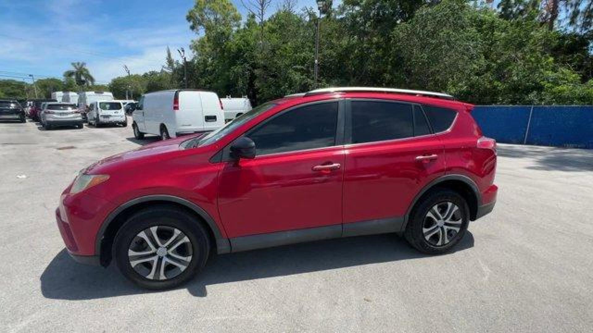 2017 Red Toyota RAV4 (2T3ZFREV3HW) with an 4 2.5 L engine, Automatic transmission, located at 27610 S Dixie Hwy, Homestead, FL, 33032, (305) 749-2348, 25.510241, -80.438301 - IIHS Top Safety Pick+. Only 95,766 Miles! Delivers 30 Highway MPG and 23 City MPG! This Toyota RAV4 boasts a Regular Unleaded I-4 2.5 L/152 engine powering this Automatic transmission. Wheels: 17 x 6.5J -inc: caps, Urethane Gear Shifter Material, Trip Computer.*This Toyota RAV4 Comes Equipped with T - Photo#1