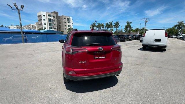 2017 Red Toyota RAV4 (2T3ZFREV3HW) with an 4 2.5 L engine, Automatic transmission, located at 27610 S Dixie Hwy, Homestead, FL, 33032, (305) 749-2348, 25.510241, -80.438301 - IIHS Top Safety Pick+. Only 95,766 Miles! Delivers 30 Highway MPG and 23 City MPG! This Toyota RAV4 boasts a Regular Unleaded I-4 2.5 L/152 engine powering this Automatic transmission. Wheels: 17 x 6.5J -inc: caps, Urethane Gear Shifter Material, Trip Computer.*This Toyota RAV4 Comes Equipped with T - Photo#3