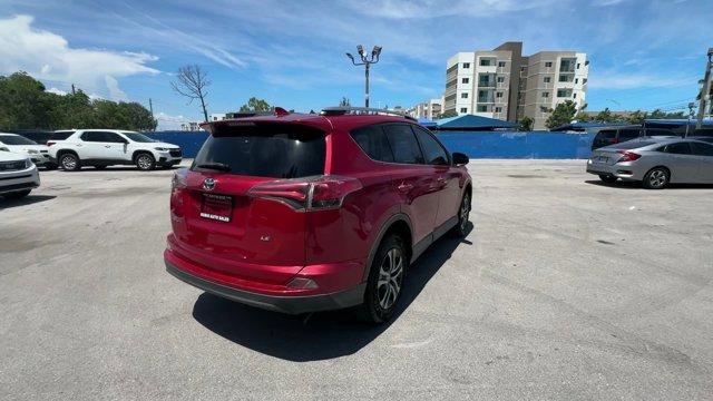 2017 Red Toyota RAV4 (2T3ZFREV3HW) with an 4 2.5 L engine, Automatic transmission, located at 27610 S Dixie Hwy, Homestead, FL, 33032, (305) 749-2348, 25.510241, -80.438301 - IIHS Top Safety Pick+. Only 95,766 Miles! Delivers 30 Highway MPG and 23 City MPG! This Toyota RAV4 boasts a Regular Unleaded I-4 2.5 L/152 engine powering this Automatic transmission. Wheels: 17 x 6.5J -inc: caps, Urethane Gear Shifter Material, Trip Computer.*This Toyota RAV4 Comes Equipped with T - Photo#4
