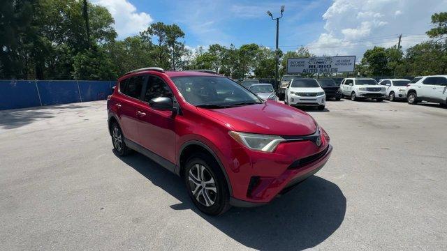 2017 Red Toyota RAV4 (2T3ZFREV3HW) with an 4 2.5 L engine, Automatic transmission, located at 27610 S Dixie Hwy, Homestead, FL, 33032, (305) 749-2348, 25.510241, -80.438301 - IIHS Top Safety Pick+. Only 95,766 Miles! Delivers 30 Highway MPG and 23 City MPG! This Toyota RAV4 boasts a Regular Unleaded I-4 2.5 L/152 engine powering this Automatic transmission. Wheels: 17 x 6.5J -inc: caps, Urethane Gear Shifter Material, Trip Computer.*This Toyota RAV4 Comes Equipped with T - Photo#6