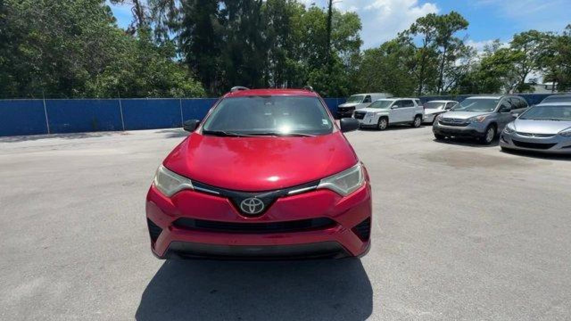 2017 Red Toyota RAV4 (2T3ZFREV3HW) with an 4 2.5 L engine, Automatic transmission, located at 27610 S Dixie Hwy, Homestead, FL, 33032, (305) 749-2348, 25.510241, -80.438301 - IIHS Top Safety Pick+. Only 95,766 Miles! Delivers 30 Highway MPG and 23 City MPG! This Toyota RAV4 boasts a Regular Unleaded I-4 2.5 L/152 engine powering this Automatic transmission. Wheels: 17 x 6.5J -inc: caps, Urethane Gear Shifter Material, Trip Computer.*This Toyota RAV4 Comes Equipped with T - Photo#7
