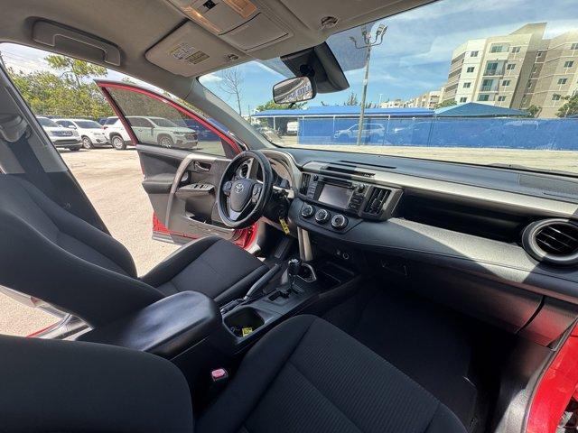 2017 Red Toyota RAV4 (2T3ZFREV3HW) with an 4 2.5 L engine, Automatic transmission, located at 27610 S Dixie Hwy, Homestead, FL, 33032, (305) 749-2348, 25.510241, -80.438301 - IIHS Top Safety Pick+. Only 95,766 Miles! Delivers 30 Highway MPG and 23 City MPG! This Toyota RAV4 boasts a Regular Unleaded I-4 2.5 L/152 engine powering this Automatic transmission. Wheels: 17 x 6.5J -inc: caps, Urethane Gear Shifter Material, Trip Computer.*This Toyota RAV4 Comes Equipped with T - Photo#12