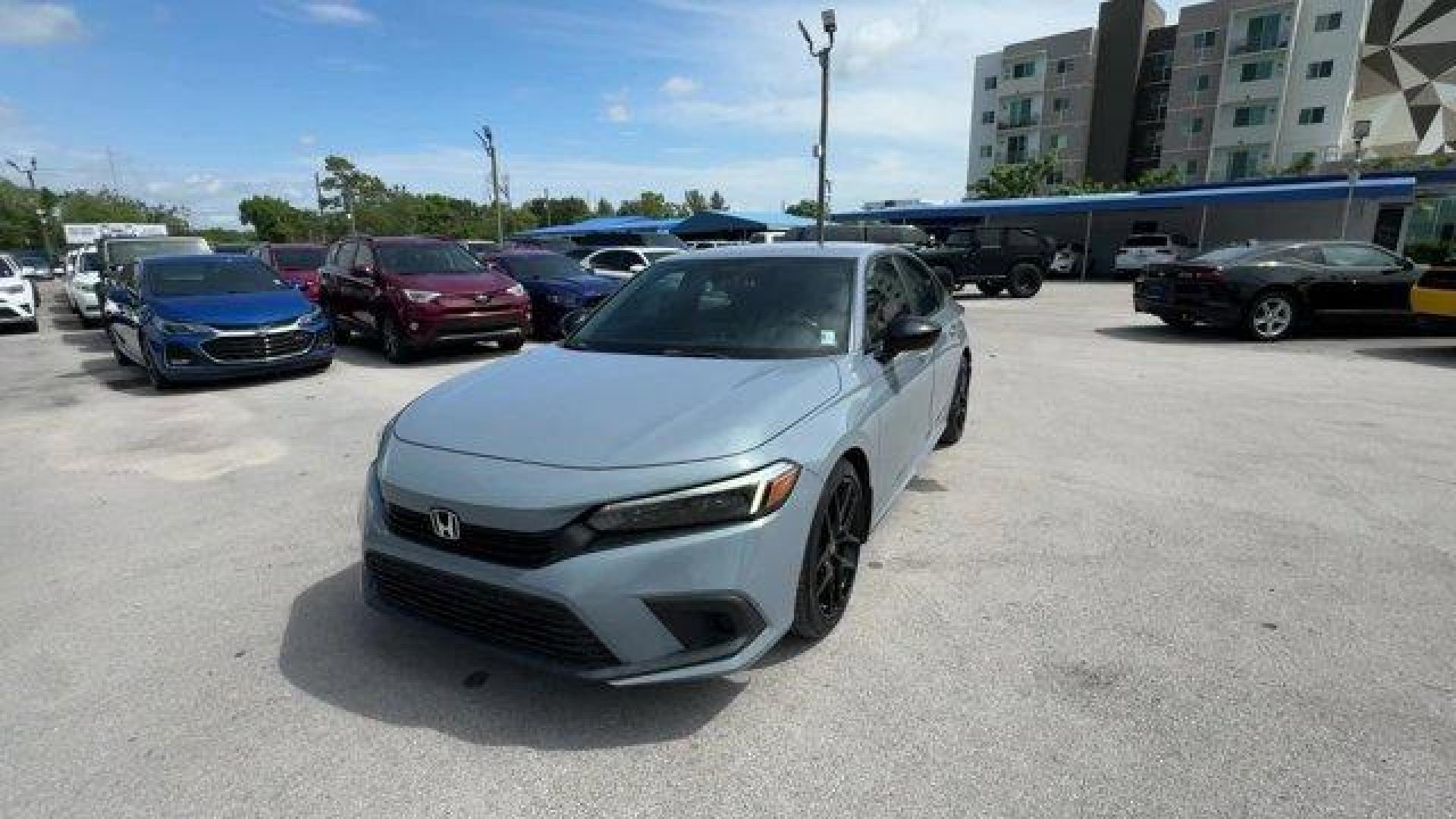 2022 Gray Honda Civic Sedan (2HGFE2F58NH) with an 4 2.0 L engine, Variable transmission, located at 27610 S Dixie Hwy, Homestead, FL, 33032, (305) 749-2348, 25.510241, -80.438301 - NACTOY 2022 North American Car of the Year. Only 35,420 Miles! Scores 37 Highway MPG and 30 City MPG! This Honda Civic Sedan boasts a Regular Unleaded I-4 2.0 L/122 engine powering this Variable transmission. Vehicle Stability Assist (VSA) Electronic Stability Control (ESC), Trunk Rear Cargo Access, - Photo#0