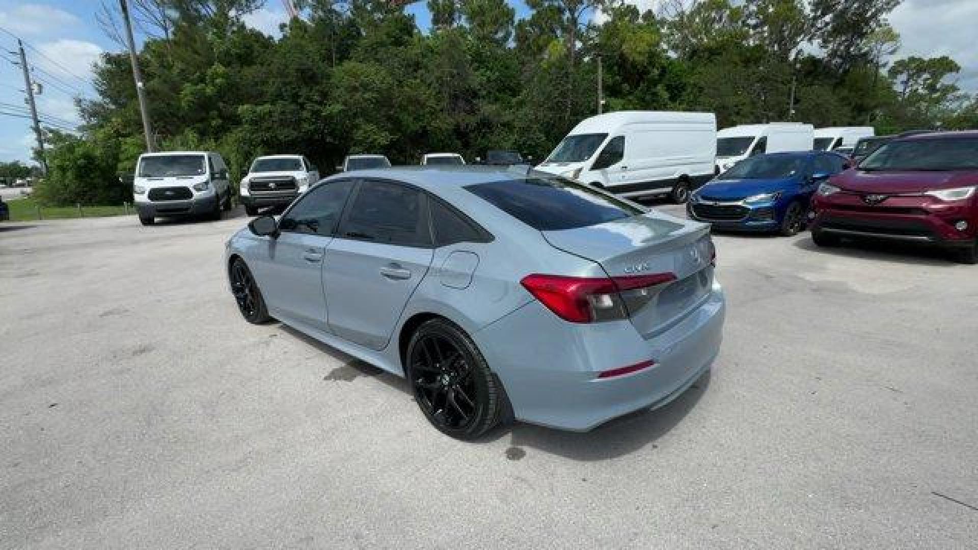 2022 Gray Honda Civic Sedan (2HGFE2F58NH) with an 4 2.0 L engine, Variable transmission, located at 27610 S Dixie Hwy, Homestead, FL, 33032, (305) 749-2348, 25.510241, -80.438301 - NACTOY 2022 North American Car of the Year. Only 35,420 Miles! Scores 37 Highway MPG and 30 City MPG! This Honda Civic Sedan boasts a Regular Unleaded I-4 2.0 L/122 engine powering this Variable transmission. Vehicle Stability Assist (VSA) Electronic Stability Control (ESC), Trunk Rear Cargo Access, - Photo#1