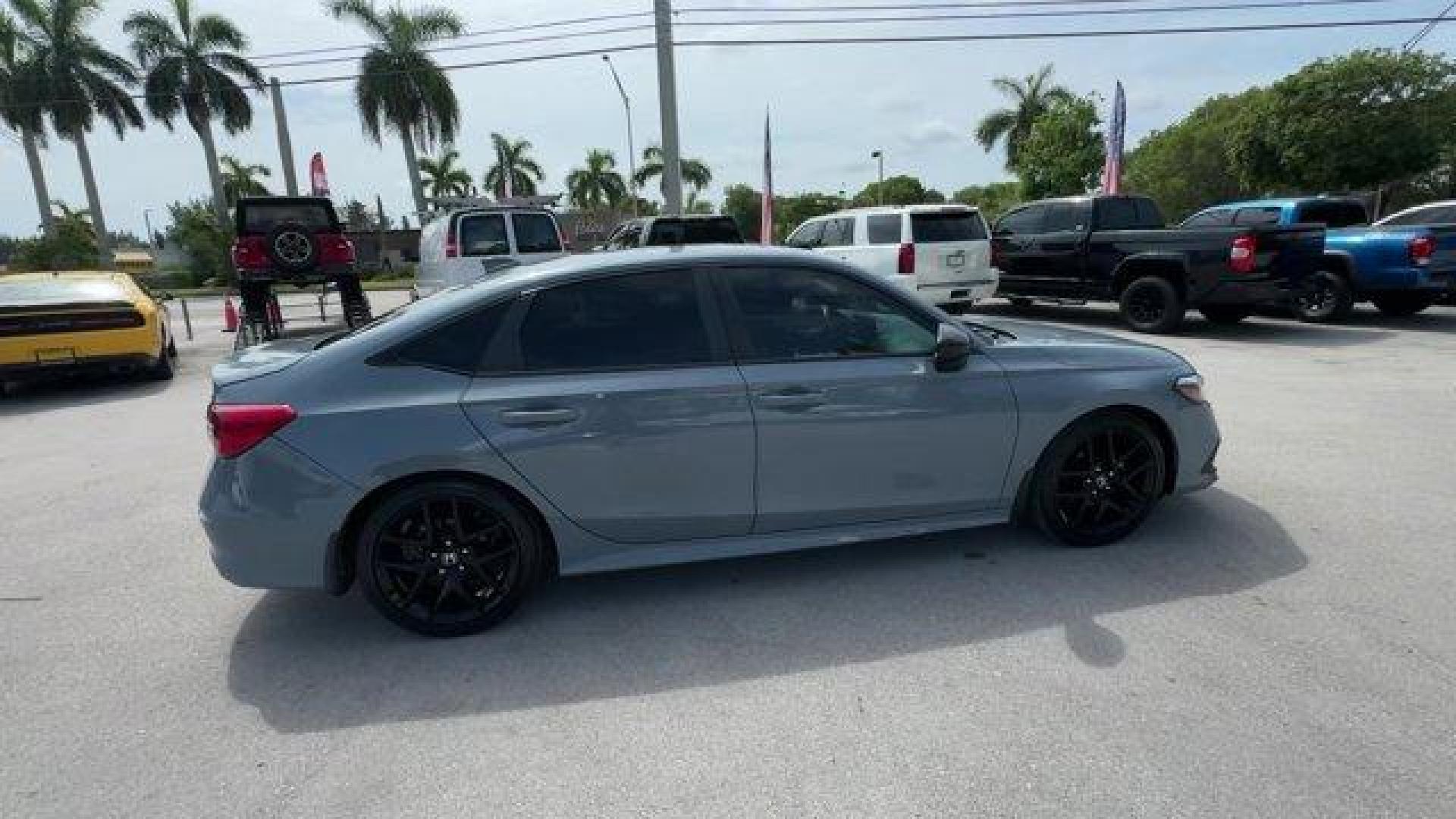2022 Gray Honda Civic Sedan (2HGFE2F58NH) with an 4 2.0 L engine, Variable transmission, located at 27610 S Dixie Hwy, Homestead, FL, 33032, (305) 749-2348, 25.510241, -80.438301 - NACTOY 2022 North American Car of the Year. Only 35,420 Miles! Scores 37 Highway MPG and 30 City MPG! This Honda Civic Sedan boasts a Regular Unleaded I-4 2.0 L/122 engine powering this Variable transmission. Vehicle Stability Assist (VSA) Electronic Stability Control (ESC), Trunk Rear Cargo Access, - Photo#4