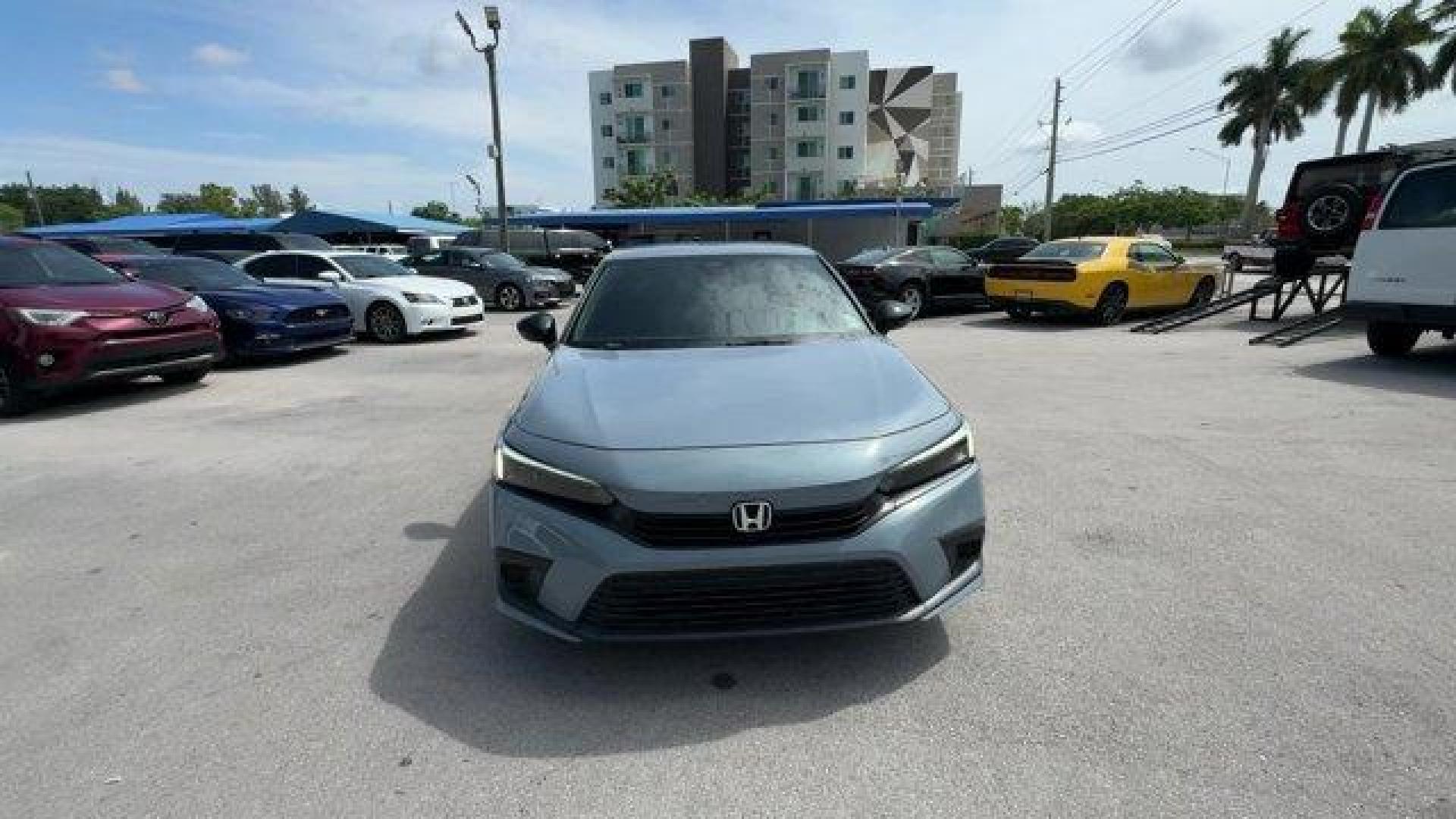 2022 Gray Honda Civic Sedan (2HGFE2F58NH) with an 4 2.0 L engine, Variable transmission, located at 27610 S Dixie Hwy, Homestead, FL, 33032, (305) 749-2348, 25.510241, -80.438301 - NACTOY 2022 North American Car of the Year. Only 35,420 Miles! Scores 37 Highway MPG and 30 City MPG! This Honda Civic Sedan boasts a Regular Unleaded I-4 2.0 L/122 engine powering this Variable transmission. Vehicle Stability Assist (VSA) Electronic Stability Control (ESC), Trunk Rear Cargo Access, - Photo#6