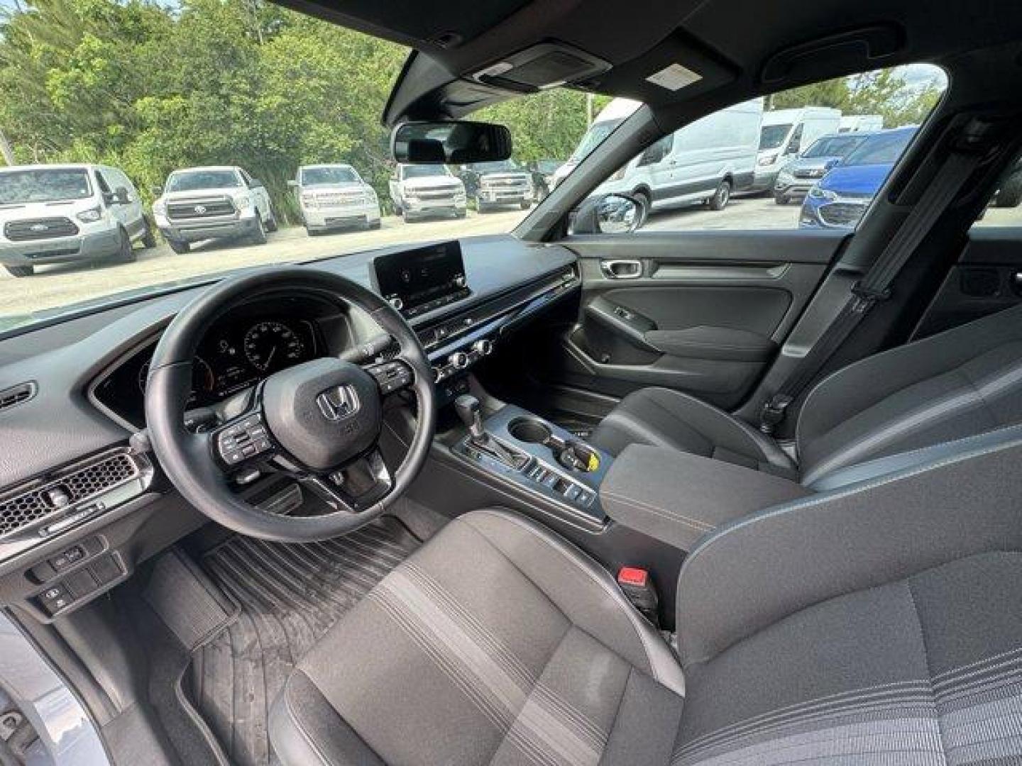2022 Gray Honda Civic Sedan (2HGFE2F58NH) with an 4 2.0 L engine, Variable transmission, located at 27610 S Dixie Hwy, Homestead, FL, 33032, (305) 749-2348, 25.510241, -80.438301 - NACTOY 2022 North American Car of the Year. Only 35,420 Miles! Scores 37 Highway MPG and 30 City MPG! This Honda Civic Sedan boasts a Regular Unleaded I-4 2.0 L/122 engine powering this Variable transmission. Vehicle Stability Assist (VSA) Electronic Stability Control (ESC), Trunk Rear Cargo Access, - Photo#9