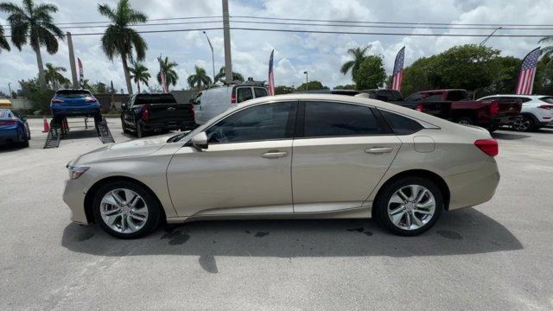 2018 Gold Honda Accord Sedan (1HGCV1F19JA) with an 4 1.5 L engine, Variable transmission, located at 27610 S Dixie Hwy, Homestead, FL, 33032, (305) 749-2348, 25.510241, -80.438301 - ALG Residual Value Awards, Residual Value Awards. Boasts 38 Highway MPG and 30 City MPG! This Honda Accord Sedan delivers a Intercooled Turbo Regular Unleaded I-4 1.5 L/91 engine powering this Variable transmission. Wheels: 17 Silver-Painted Alloy, VSA Electronic Stability Control (ESC), Valet Funct - Photo#1