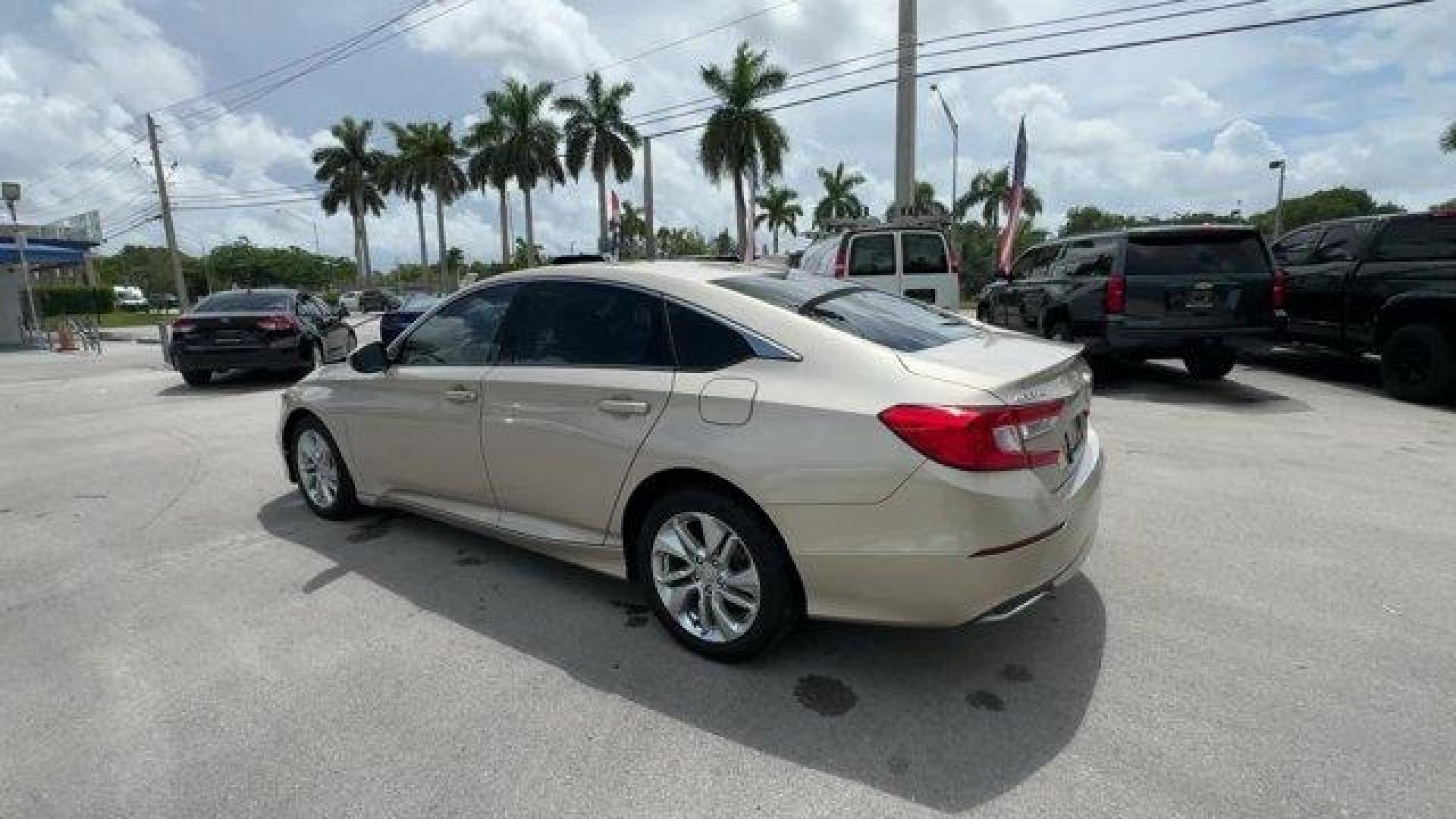 2018 Gold Honda Accord Sedan (1HGCV1F19JA) with an 4 1.5 L engine, Variable transmission, located at 27610 S Dixie Hwy, Homestead, FL, 33032, (305) 749-2348, 25.510241, -80.438301 - ALG Residual Value Awards, Residual Value Awards. Boasts 38 Highway MPG and 30 City MPG! This Honda Accord Sedan delivers a Intercooled Turbo Regular Unleaded I-4 1.5 L/91 engine powering this Variable transmission. Wheels: 17 Silver-Painted Alloy, VSA Electronic Stability Control (ESC), Valet Funct - Photo#2