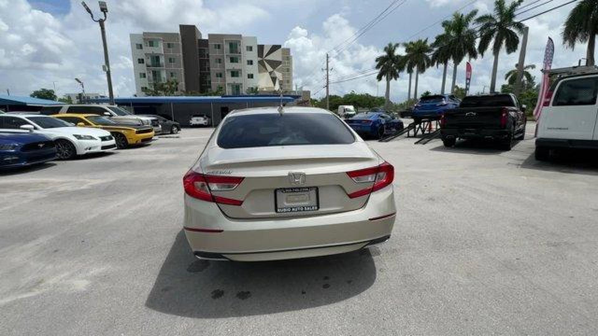 2018 Gold Honda Accord Sedan (1HGCV1F19JA) with an 4 1.5 L engine, Variable transmission, located at 27610 S Dixie Hwy, Homestead, FL, 33032, (305) 749-2348, 25.510241, -80.438301 - ALG Residual Value Awards, Residual Value Awards. Boasts 38 Highway MPG and 30 City MPG! This Honda Accord Sedan delivers a Intercooled Turbo Regular Unleaded I-4 1.5 L/91 engine powering this Variable transmission. Wheels: 17 Silver-Painted Alloy, VSA Electronic Stability Control (ESC), Valet Funct - Photo#3