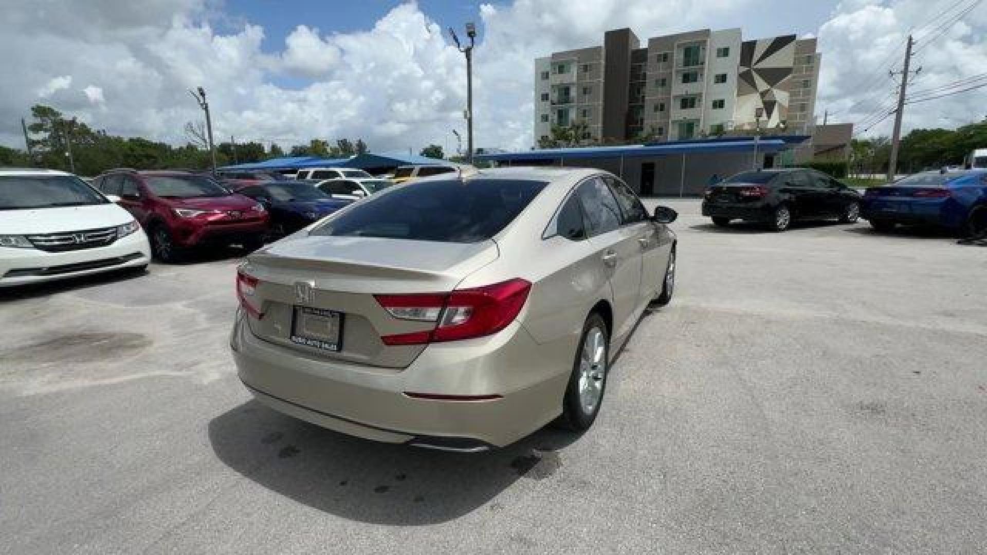 2018 Gold Honda Accord Sedan (1HGCV1F19JA) with an 4 1.5 L engine, Variable transmission, located at 27610 S Dixie Hwy, Homestead, FL, 33032, (305) 749-2348, 25.510241, -80.438301 - ALG Residual Value Awards, Residual Value Awards. Boasts 38 Highway MPG and 30 City MPG! This Honda Accord Sedan delivers a Intercooled Turbo Regular Unleaded I-4 1.5 L/91 engine powering this Variable transmission. Wheels: 17 Silver-Painted Alloy, VSA Electronic Stability Control (ESC), Valet Funct - Photo#4