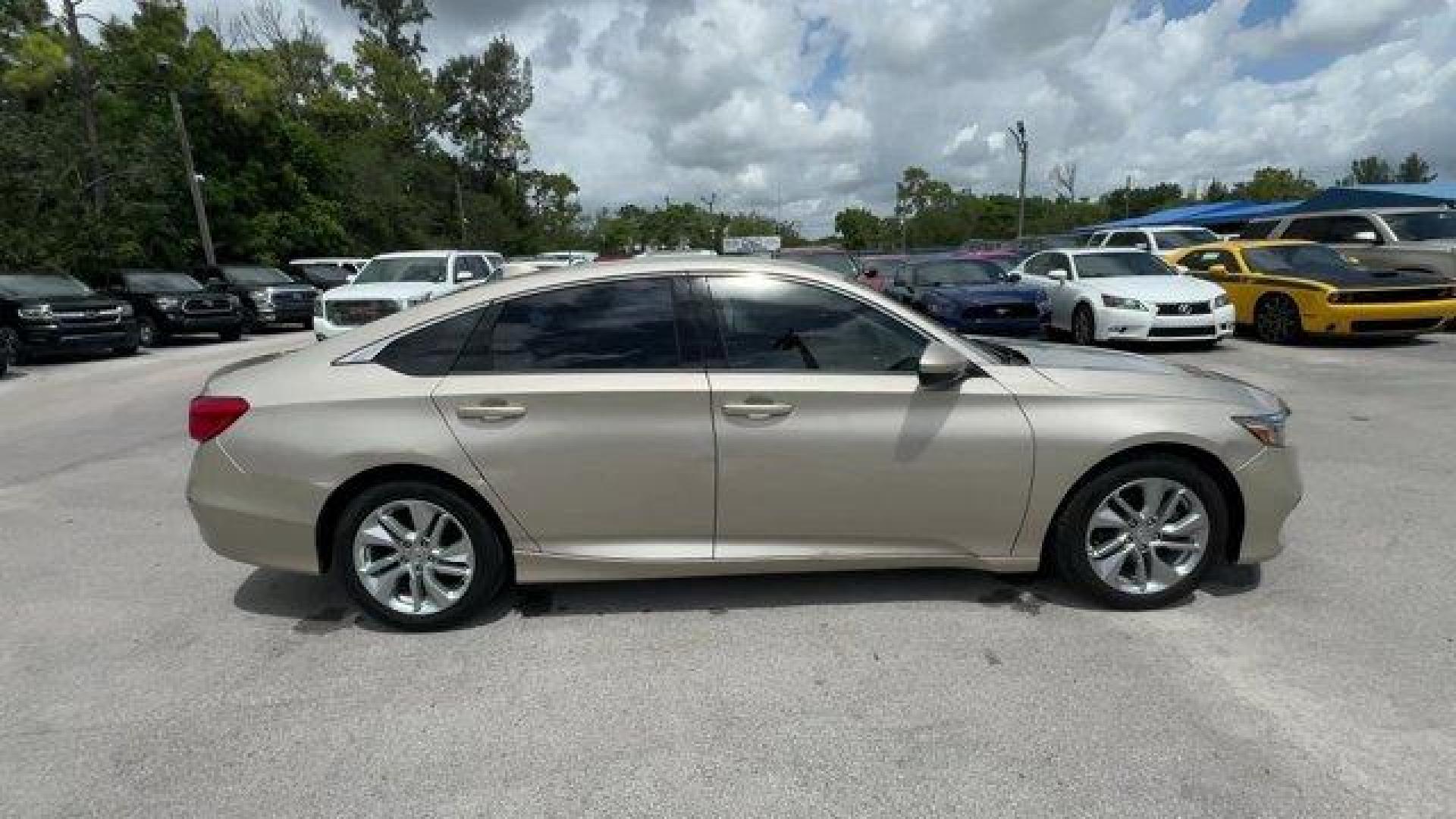 2018 Gold Honda Accord Sedan (1HGCV1F19JA) with an 4 1.5 L engine, Variable transmission, located at 27610 S Dixie Hwy, Homestead, FL, 33032, (305) 749-2348, 25.510241, -80.438301 - ALG Residual Value Awards, Residual Value Awards. Boasts 38 Highway MPG and 30 City MPG! This Honda Accord Sedan delivers a Intercooled Turbo Regular Unleaded I-4 1.5 L/91 engine powering this Variable transmission. Wheels: 17 Silver-Painted Alloy, VSA Electronic Stability Control (ESC), Valet Funct - Photo#5